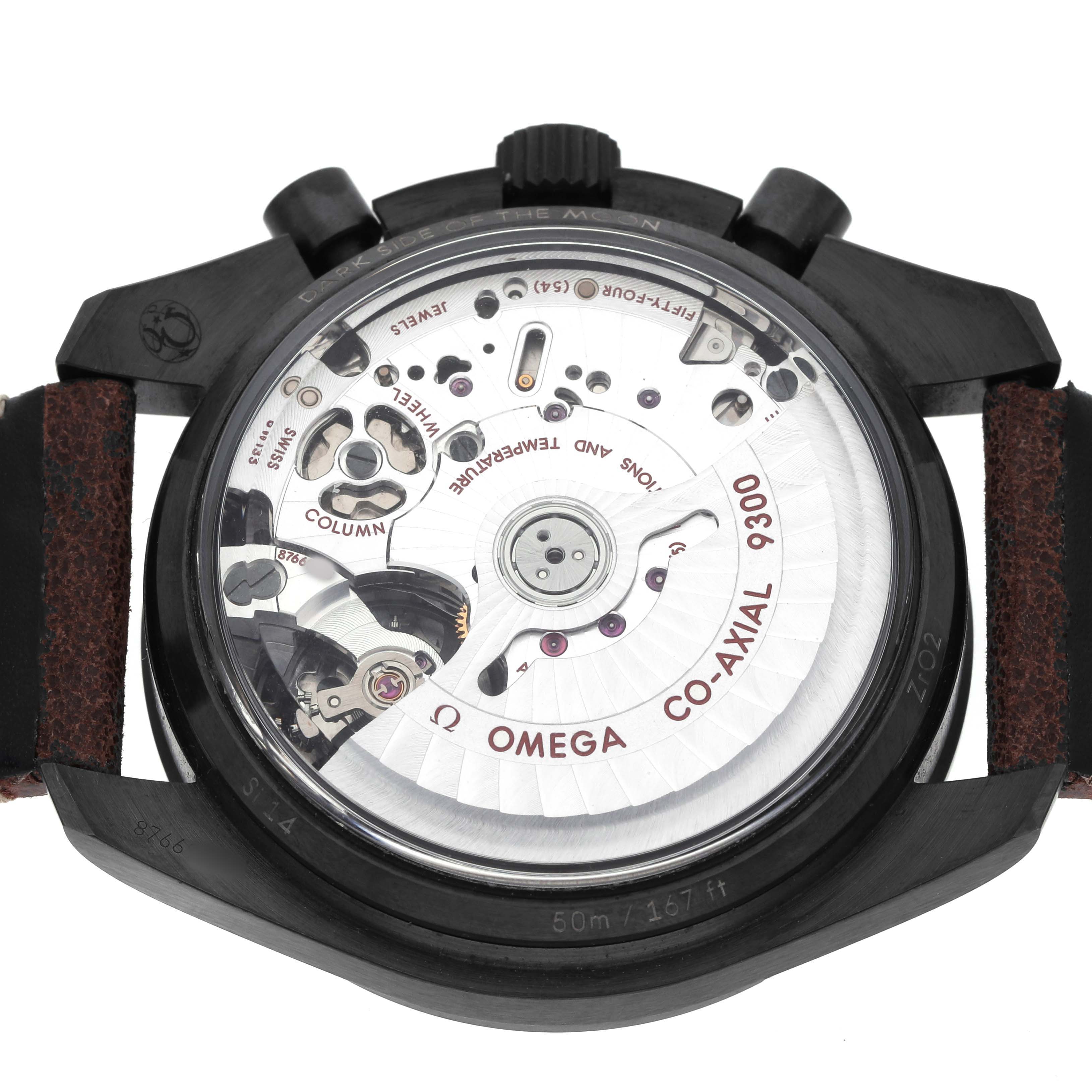 The image shows the back view of an Omega Speedmaster 311.92.44.51.01.006 Men's Ceramic Black Dial, displaying its Co-Axial 9300 movement.