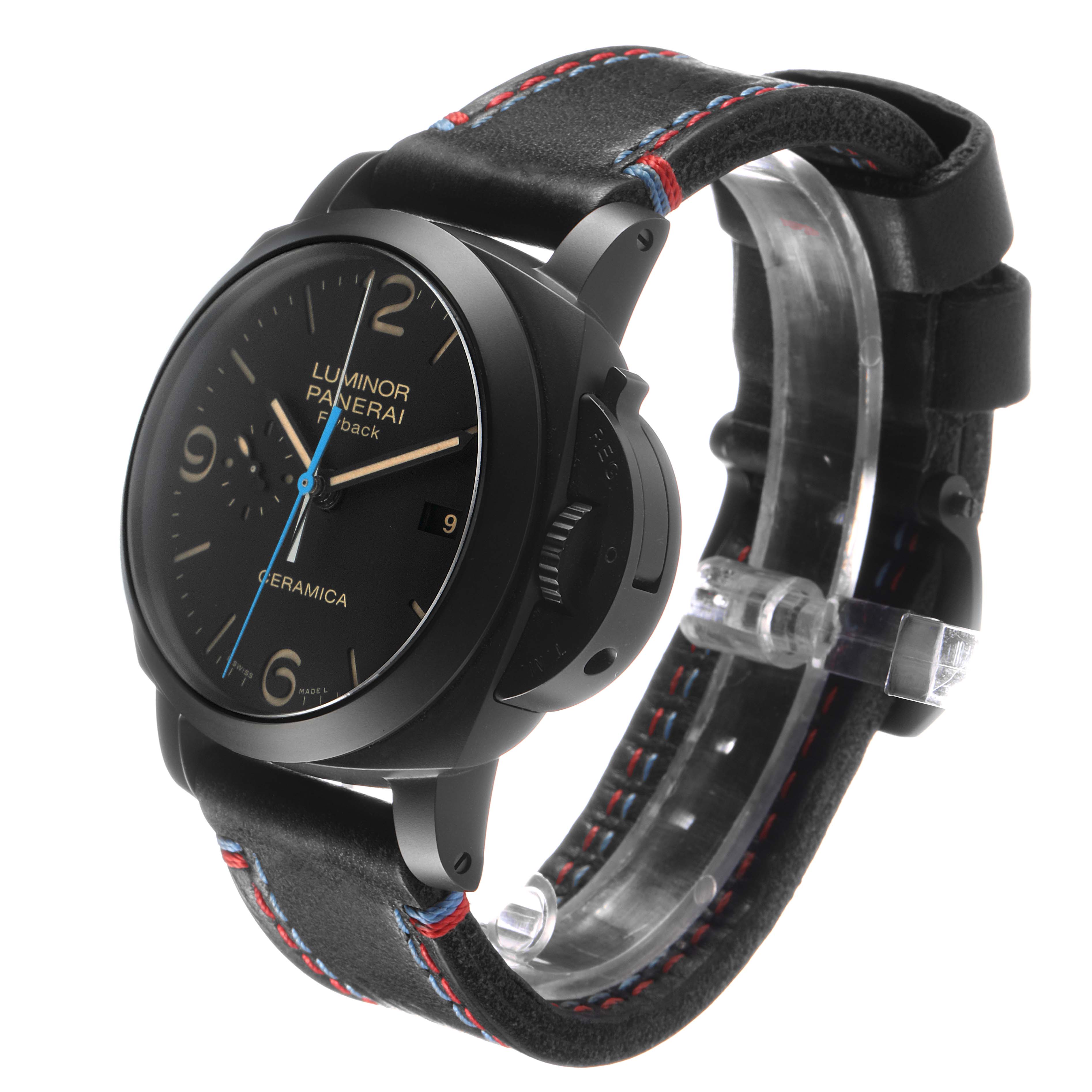 The Panerai Luminor PAM00580 Men's Ceramic Black Dial watch is shown at a side angle, displaying its black ceramic case, crown guard, and black leather strap with red and blue stitching.