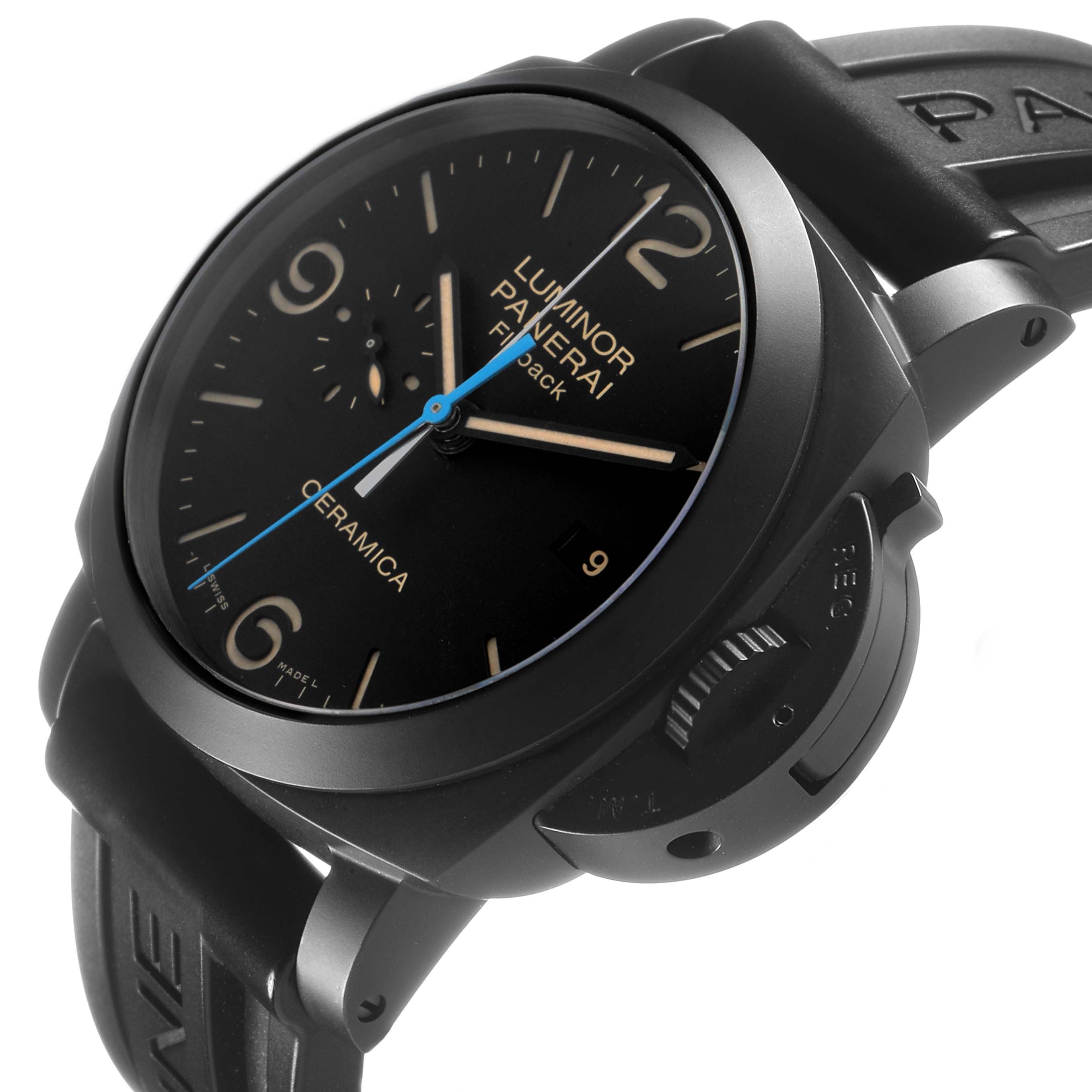 The Panerai Luminor PAM00580 Men's Ceramic Black Dial watch is shown at a tilted angle, highlighting the dial, case, crown guard, and part of the strap.