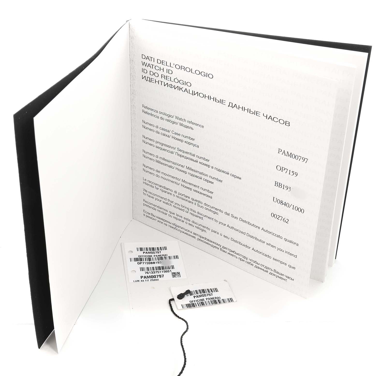 The image shows the documentation and tags for a Panerai Luminor PAM00797 Men's Titanium Brown Dial model, with details like watch reference and serial numbers.