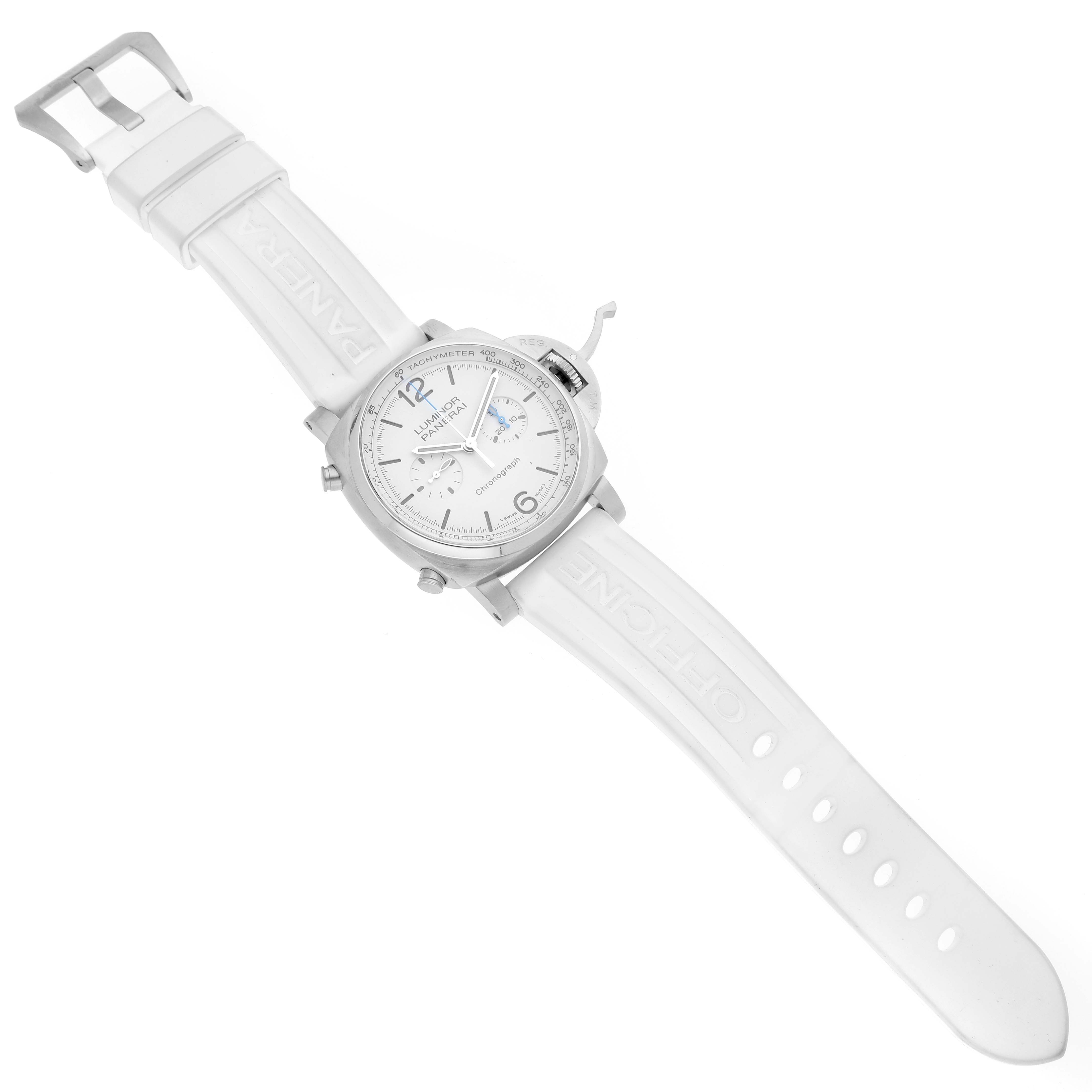 The image shows a Panerai Luminor PAM01218 Men's Stainless Steel White Dial watch angled slightly from above, highlighting the face, crown, and white strap with a buckle.