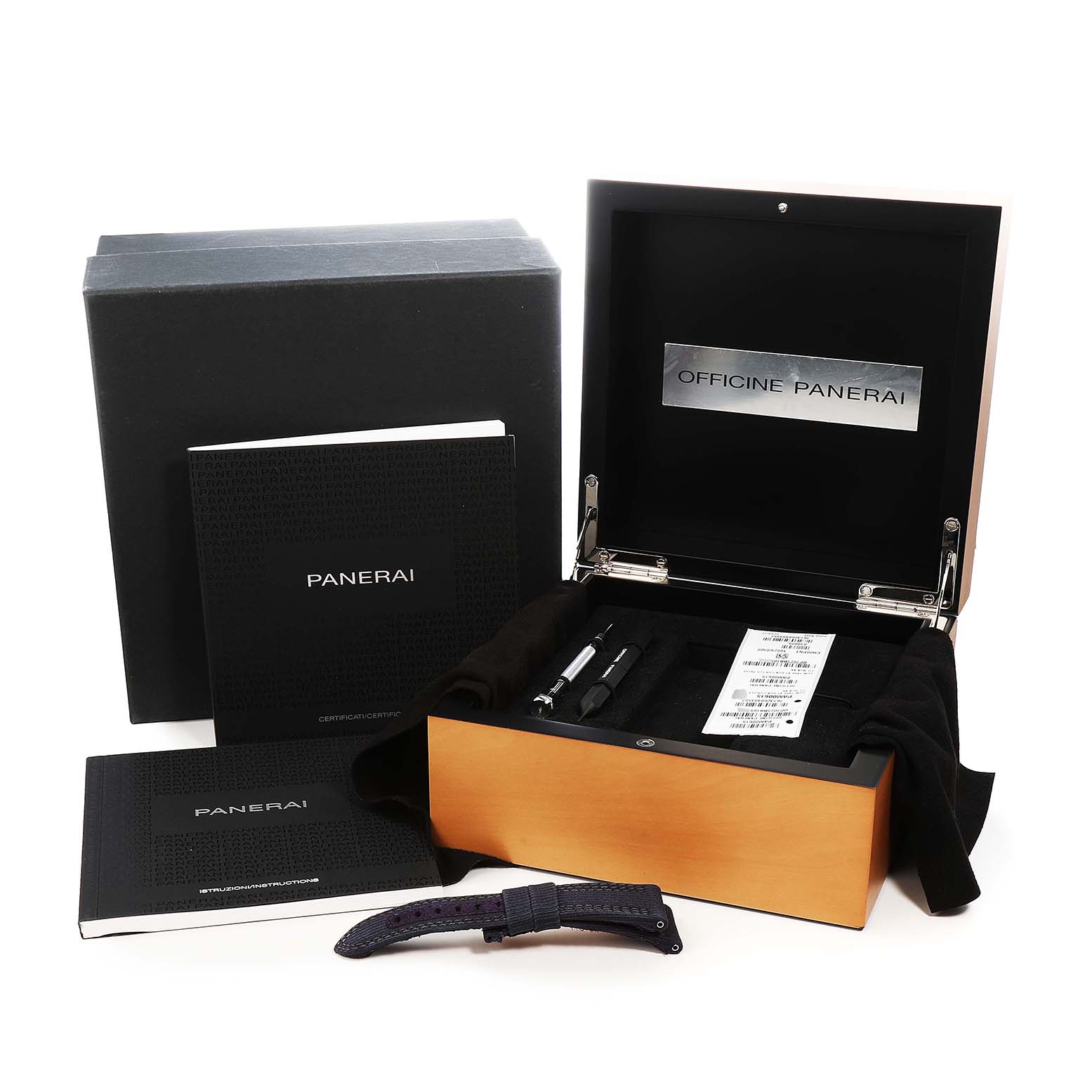 The image shows a Panerai Submersible PAM00615 Men's Titanium Black Dial watch box with manuals, tools, and an additional strap.