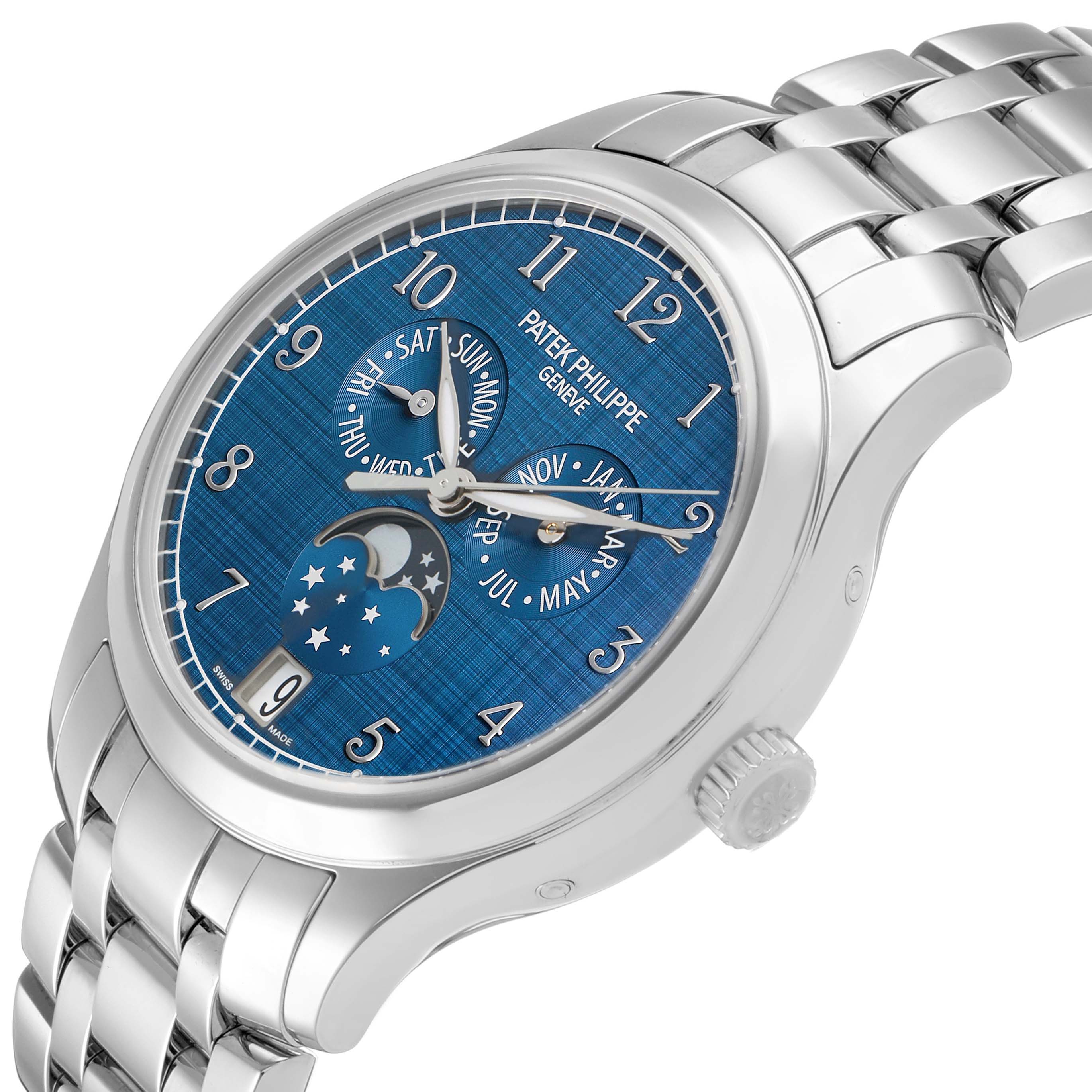 The Patek Philippe Complications 4947/1A-001 Men's Stainless Steel Blue Dial watch is shown at a slight side angle, displaying the dial, crown, and bracelet.