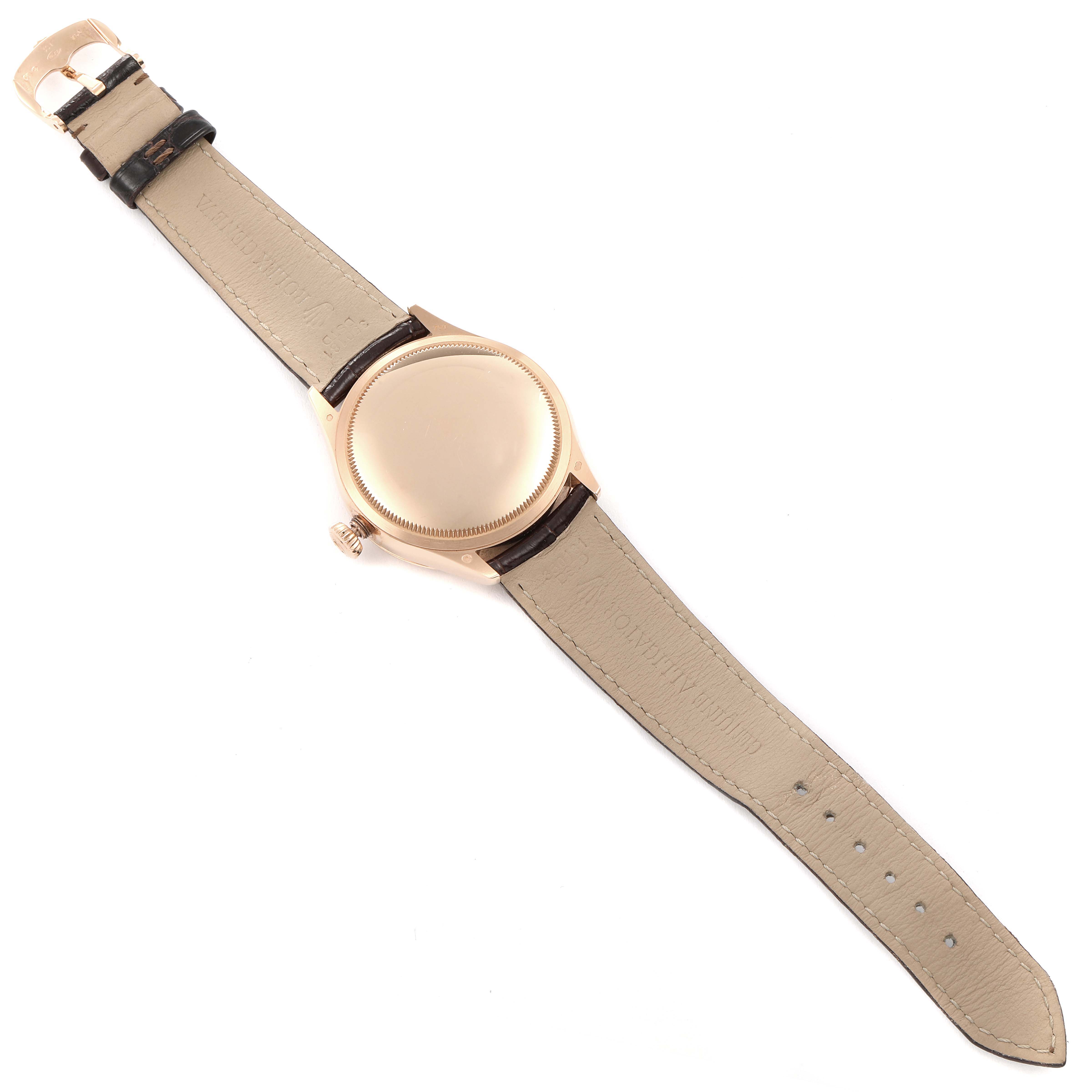 This image shows the back view of a Rolex Cellini 50525 Men
s Rose Gold Silver Dial 50525 Men
s Rose Gold Silver Dial watch, including the strap and clasp.