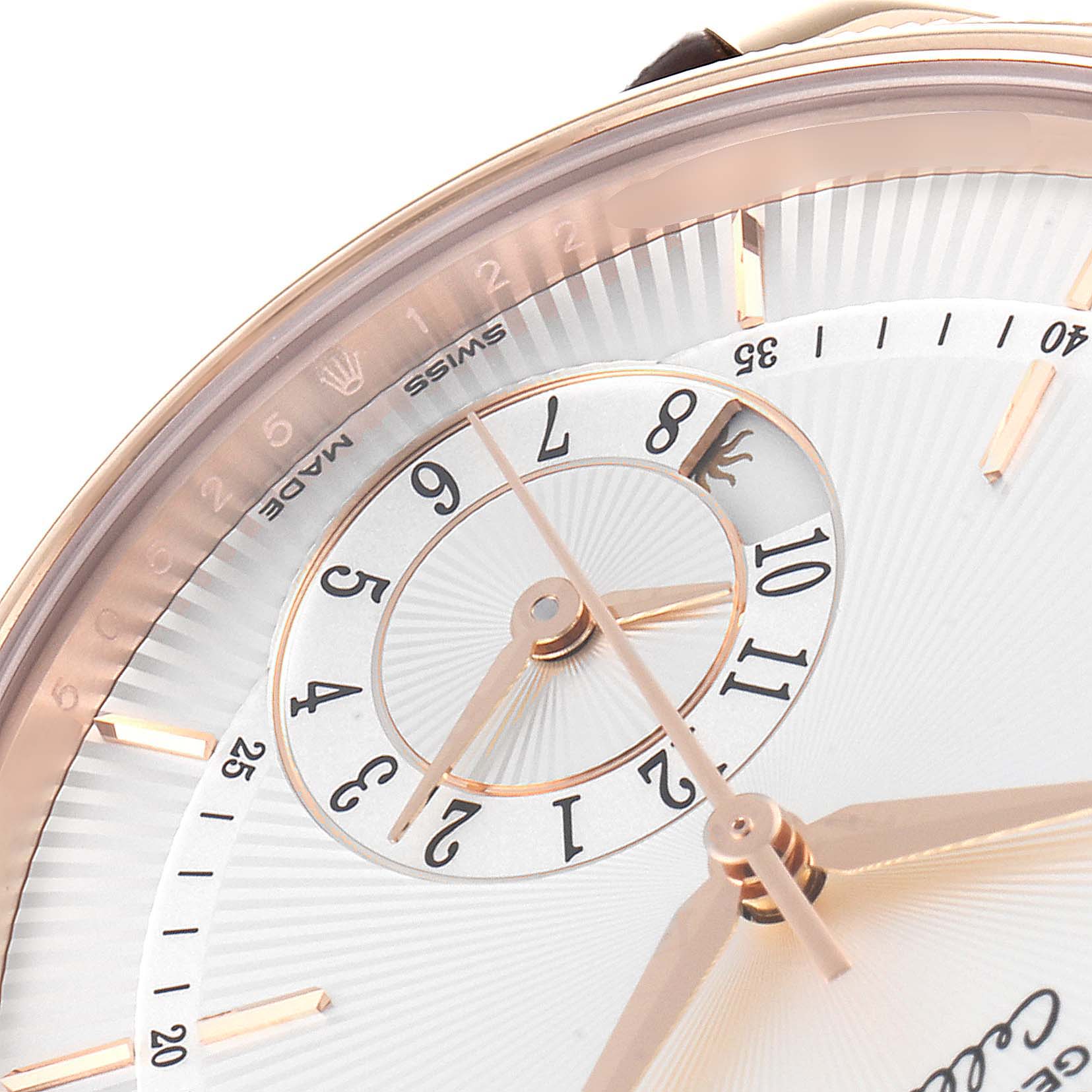 The image shows a close-up angle of the dial and bezel of a Rolex Cellini 50525 Men
s Rose Gold Silver Dial 50525 Men
s Rose Gold Silver Dial watch, highlighting the hour markers and hands.