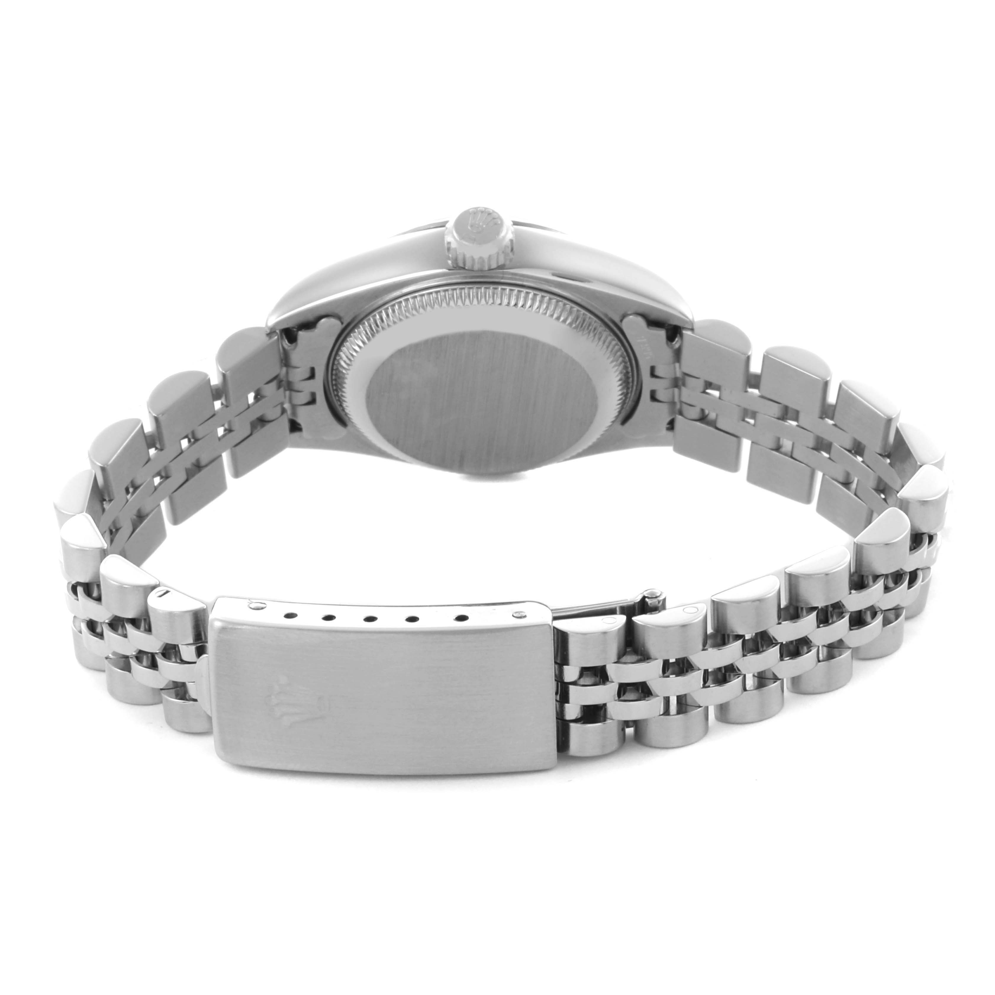 The image shows the back of a Rolex Datejust 79174 Women's Stainless Steel Mother of Pearl Dial 79174 Women's Stainless Steel Mother of Pearl Dial watch, highlighting the case back and Jubilee bracelet clasp.