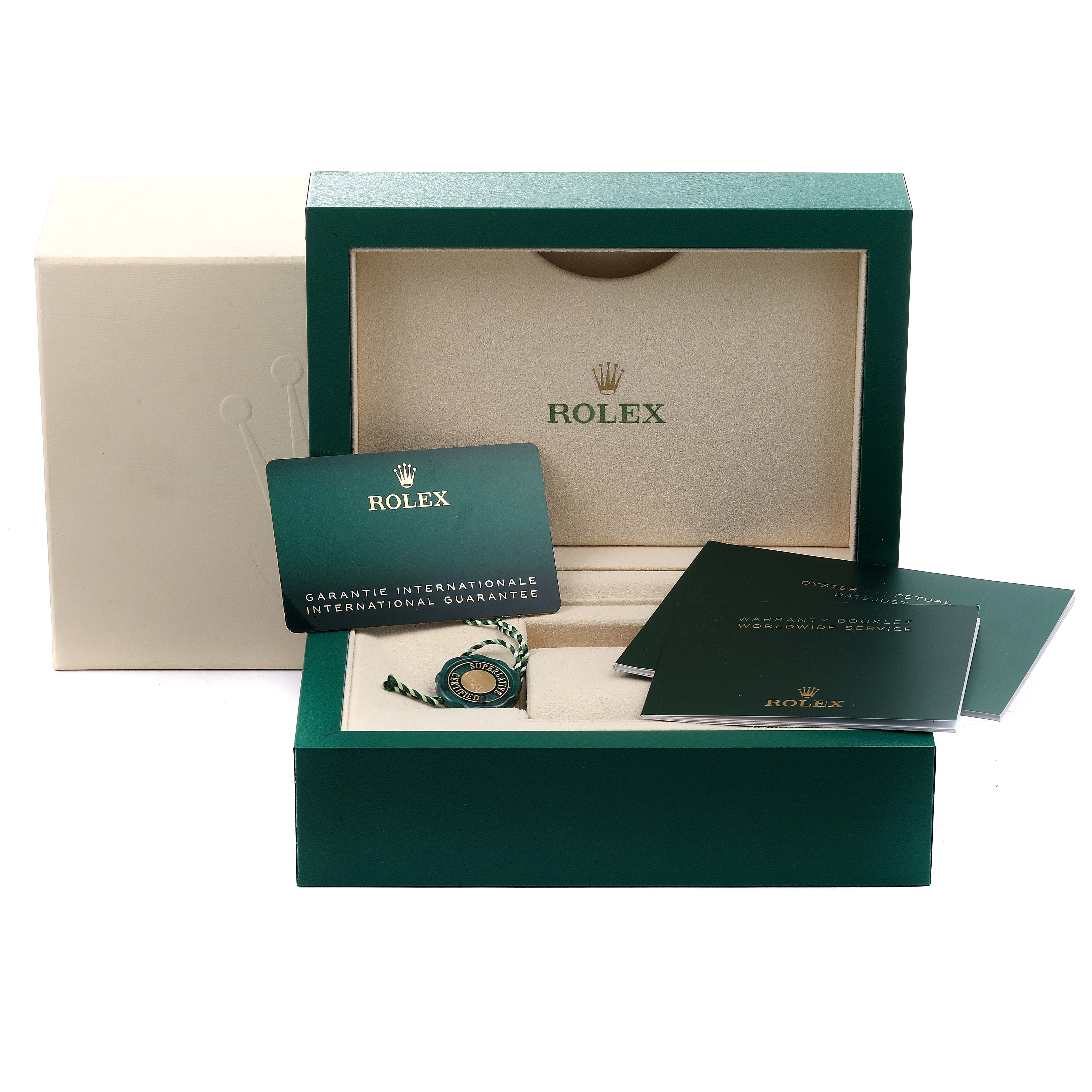 The image shows the packaging, international guarantee card, and booklets for a Rolex Datejust 126200 Men's Stainless Steel Silver Dial 126200 Men's Stainless Steel Silver Dial watch.
