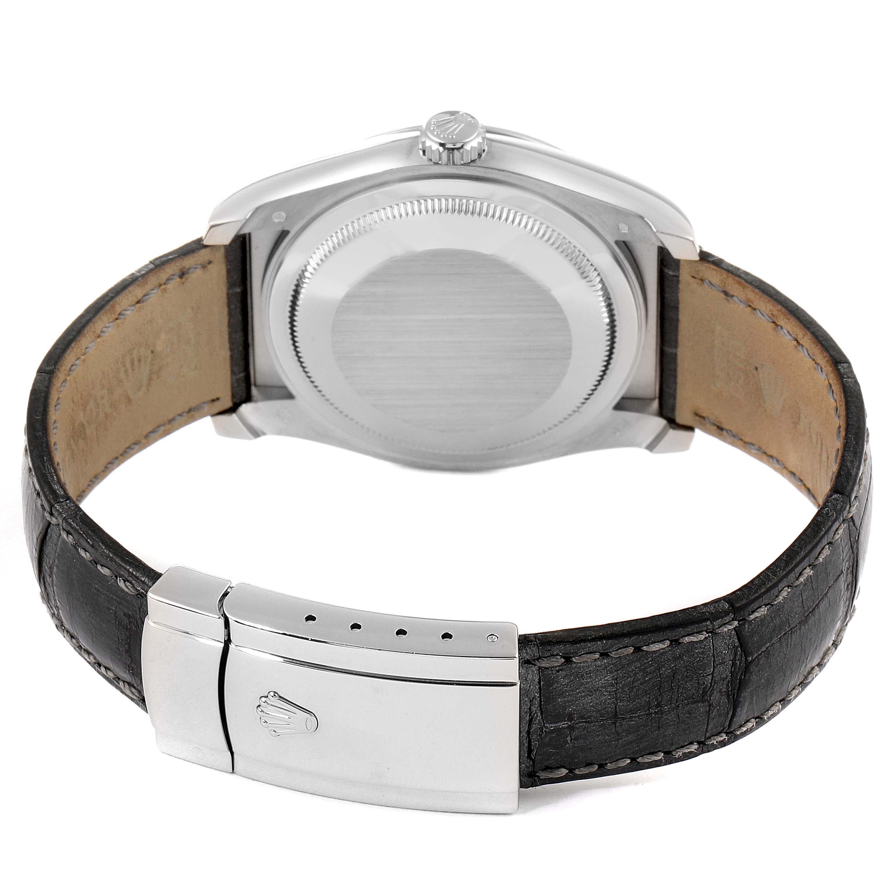 The image shows the back case, crown, and leather strap with clasp of a Rolex Datejust 116139 Men's White Gold Black Dial 116139 Men's White Gold Black Dial model watch from a rear angle.
