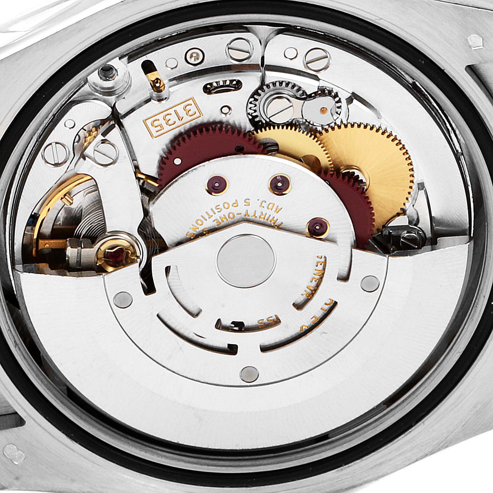 The image shows the internal mechanism of a Rolex Datejust 116139 Men's White Gold Black Dial 116139 Men's White Gold Black Dial watch, featuring gears and other intricate components.