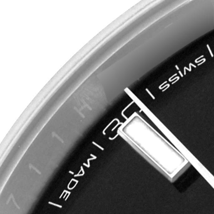 This image shows a close-up of the dial edge and markers of the Rolex Datejust 41 126300 Men's Stainless Steel Black Dial 126300 Men's Stainless Steel Black Dial.