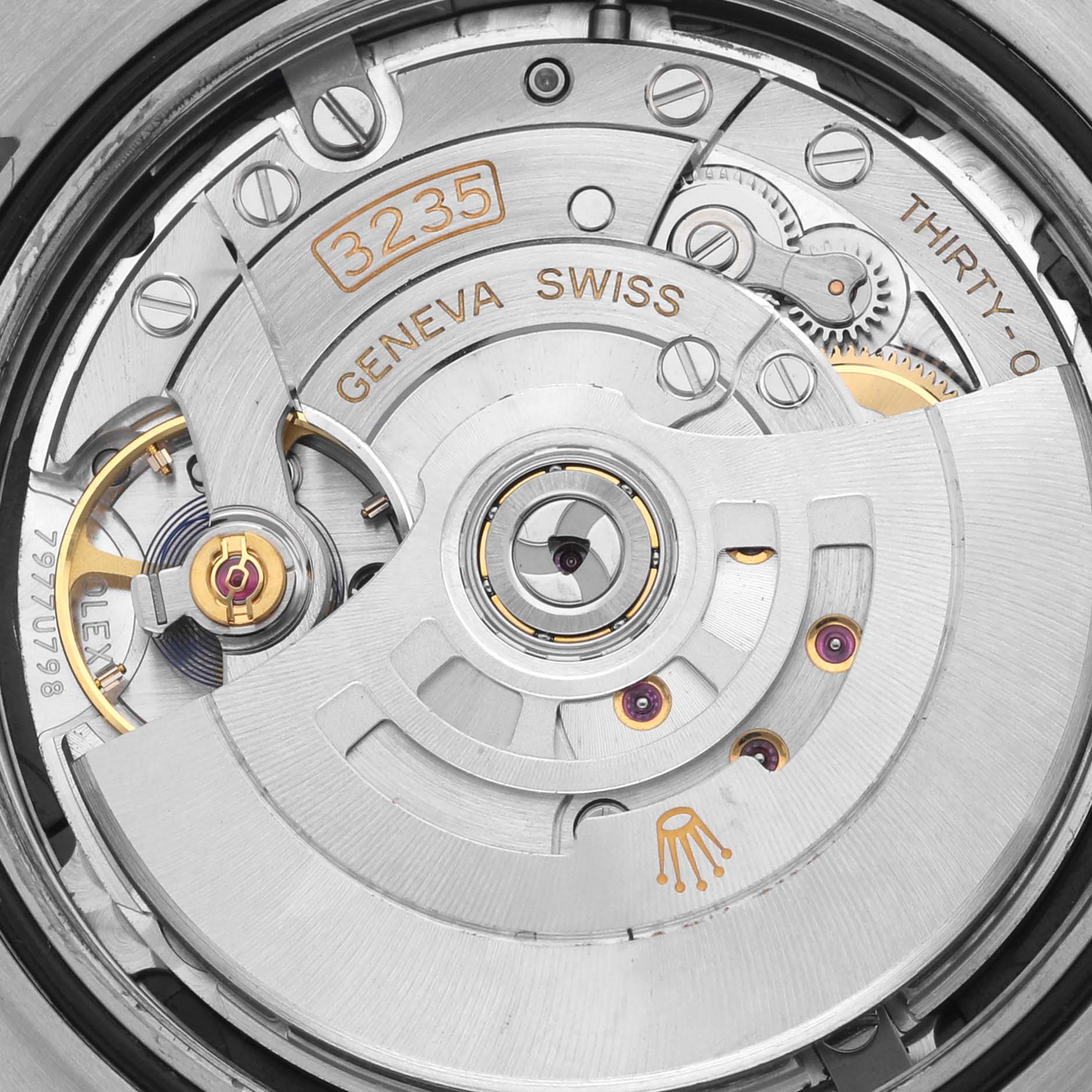 The image shows the intricate movement mechanism of a Rolex Datejust 41 126300 Men's Stainless Steel Black Dial 126300 Men's Stainless Steel Black Dial, focusing on the caliber and rotor.