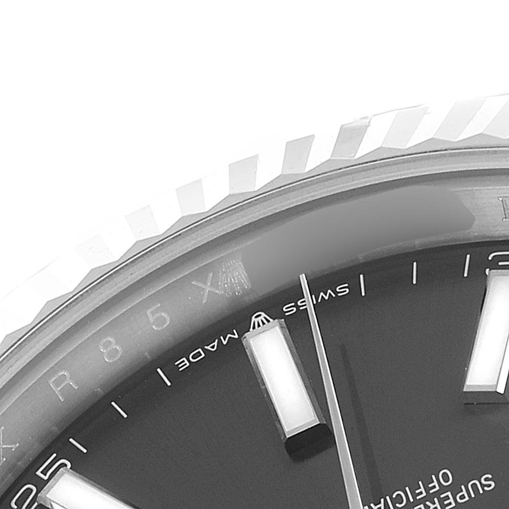 The image shows a close-up of the dial and fluted bezel of the Rolex Datejust 41 126334 Men's Stainless Steel Grey Dial 126334 Men's Stainless Steel Grey Dial model.