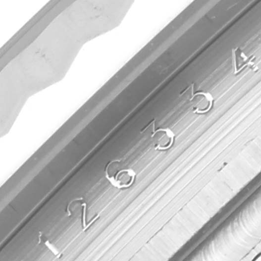 The image shows a close-up of the bezel and part of the dial with engraved numerals of the Rolex Datejust 41 126334 Men
s Stainless Steel Silver Dial 126334 Men
s Stainless Steel Silver Dial.
