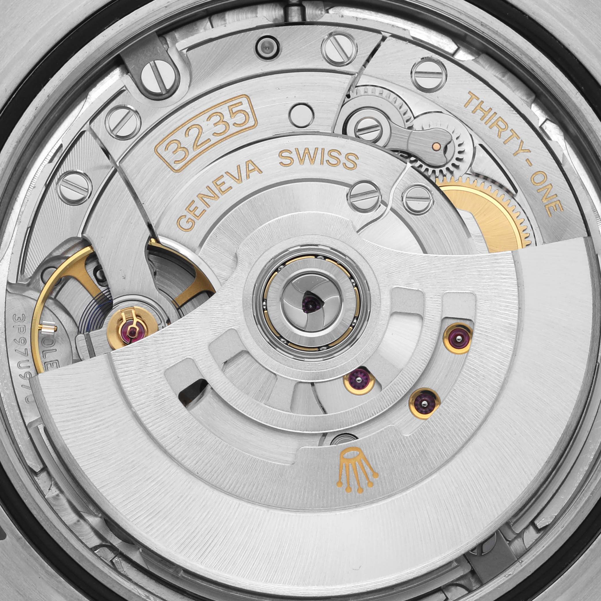 This image shows a detailed view of the Rolex Datejust 41 126334 Men
s Stainless Steel Silver Dial 126334 Men
s Stainless Steel Silver Dial
s movement, featuring its mechanical components and markings.