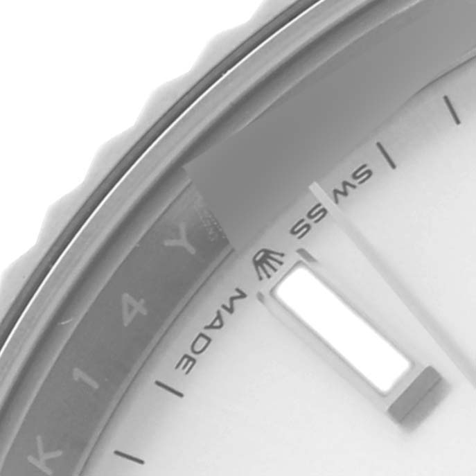 This image shows a close-up of the Rolex Datejust 41 126334 Men
s Stainless Steel Silver Dial 126334 Men
s Stainless Steel Silver Dial, featuring part of the dial, markers, and the "Swiss Made" text near the edge.
