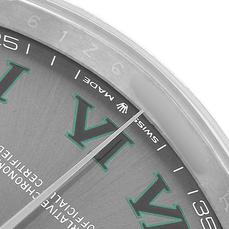 The image shows a close-up of the Rolex Datejust 41 126300 Men's Stainless Steel Grey Dial dial, highlighting the "VI" numeral and part of the bezel.