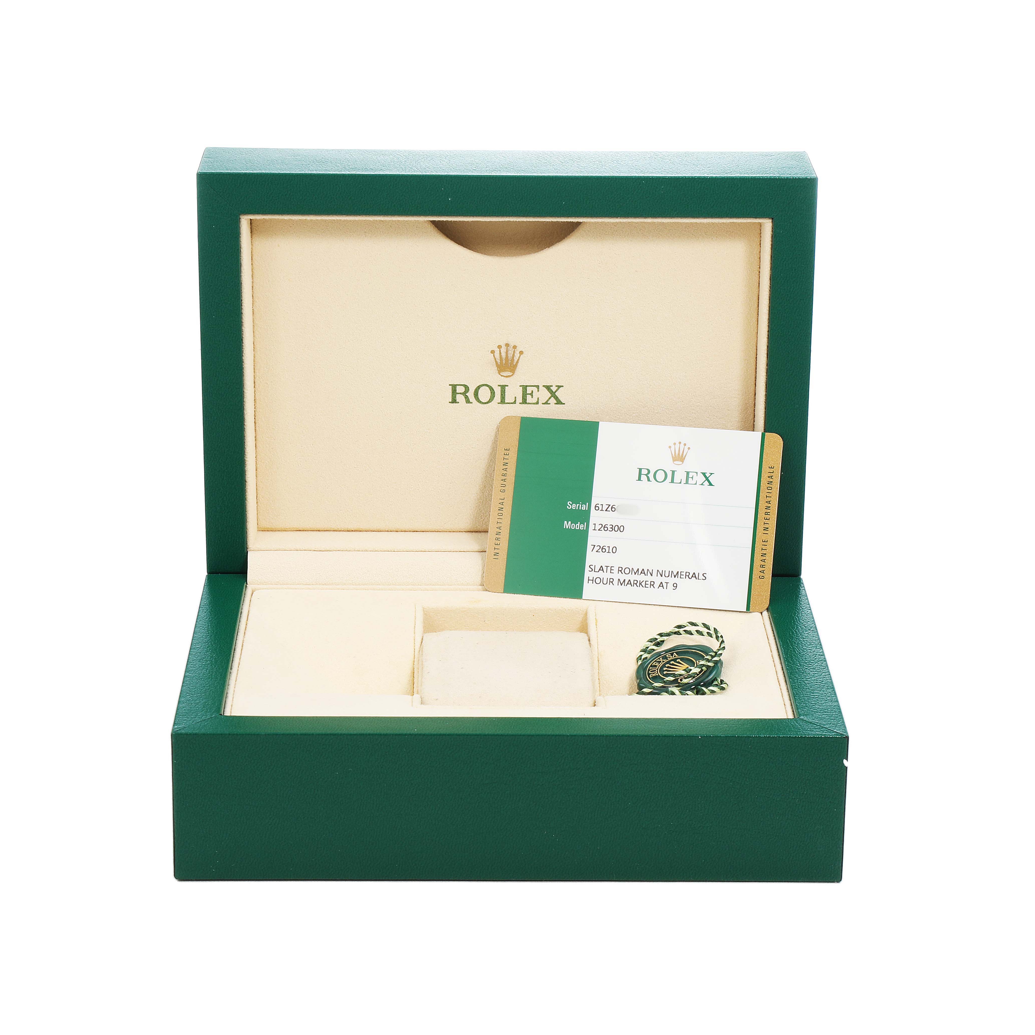 The image shows a Rolex Datejust 41 126300 Men's Stainless Steel Grey Dial watch box with papers and a tag inside.