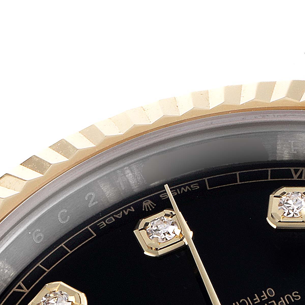 The image shows a close-up of the bezel and a portion of the dial of the Rolex Datejust 41 126333 Men's Steel and Gold (two tone) Black Dial 126333 Men's Steel and Gold (two tone) Black Dial model.