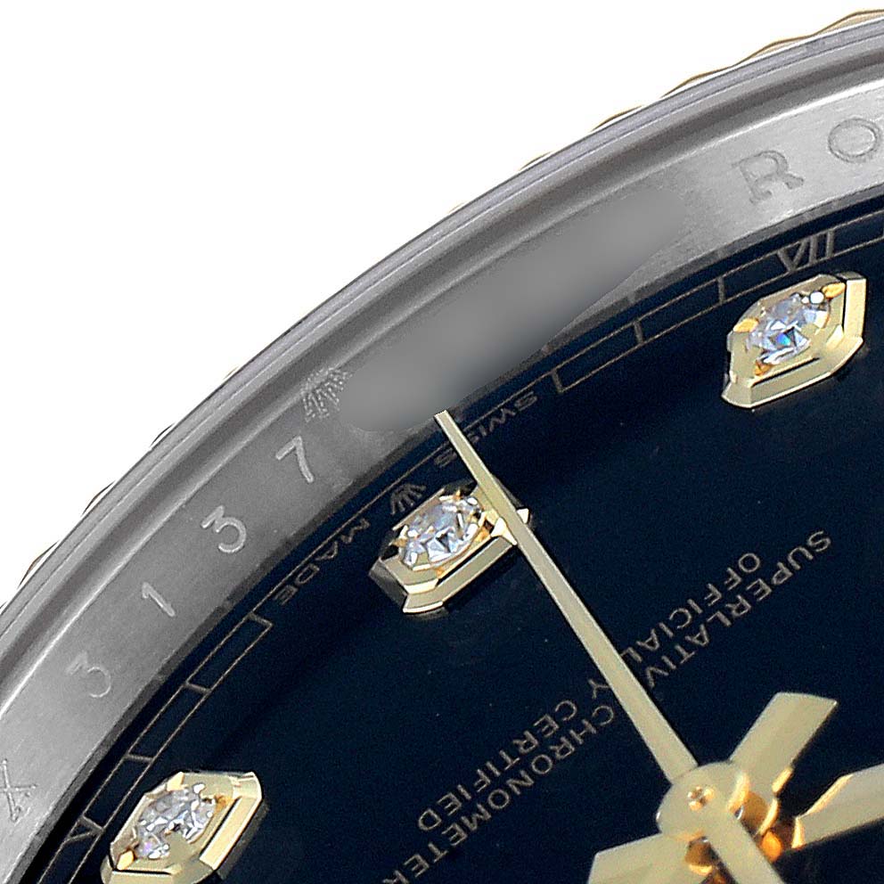 The image shows a close-up of the dial and bezel of the Rolex Datejust 41 126333 Men's Steel and Gold (two tone) Black Dial 126333 Men's Steel and Gold (two tone) Black Dial, highlighting the hour markers and hands.