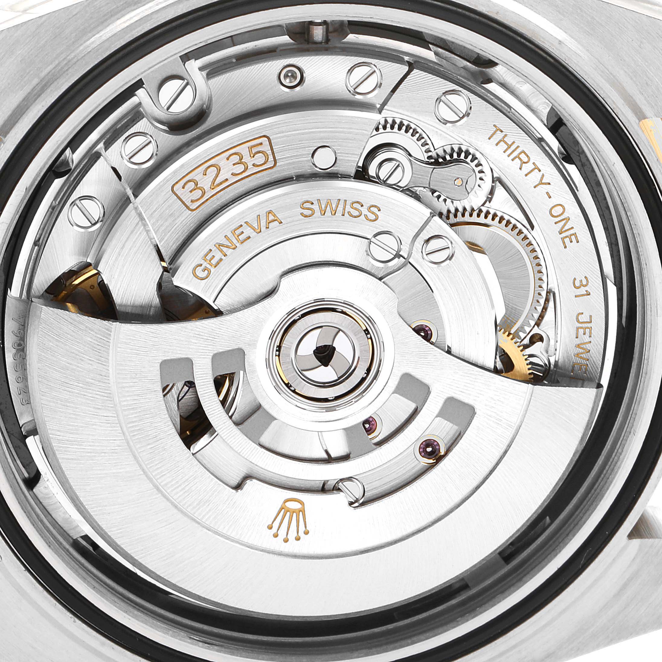 The image shows a close-up view of the movement mechanism of the Rolex Datejust 41 126333 Men's Steel and Gold (two tone) Black Dial 126333 Men's Steel and Gold (two tone) Black Dial, highlighting the 3235 caliber.