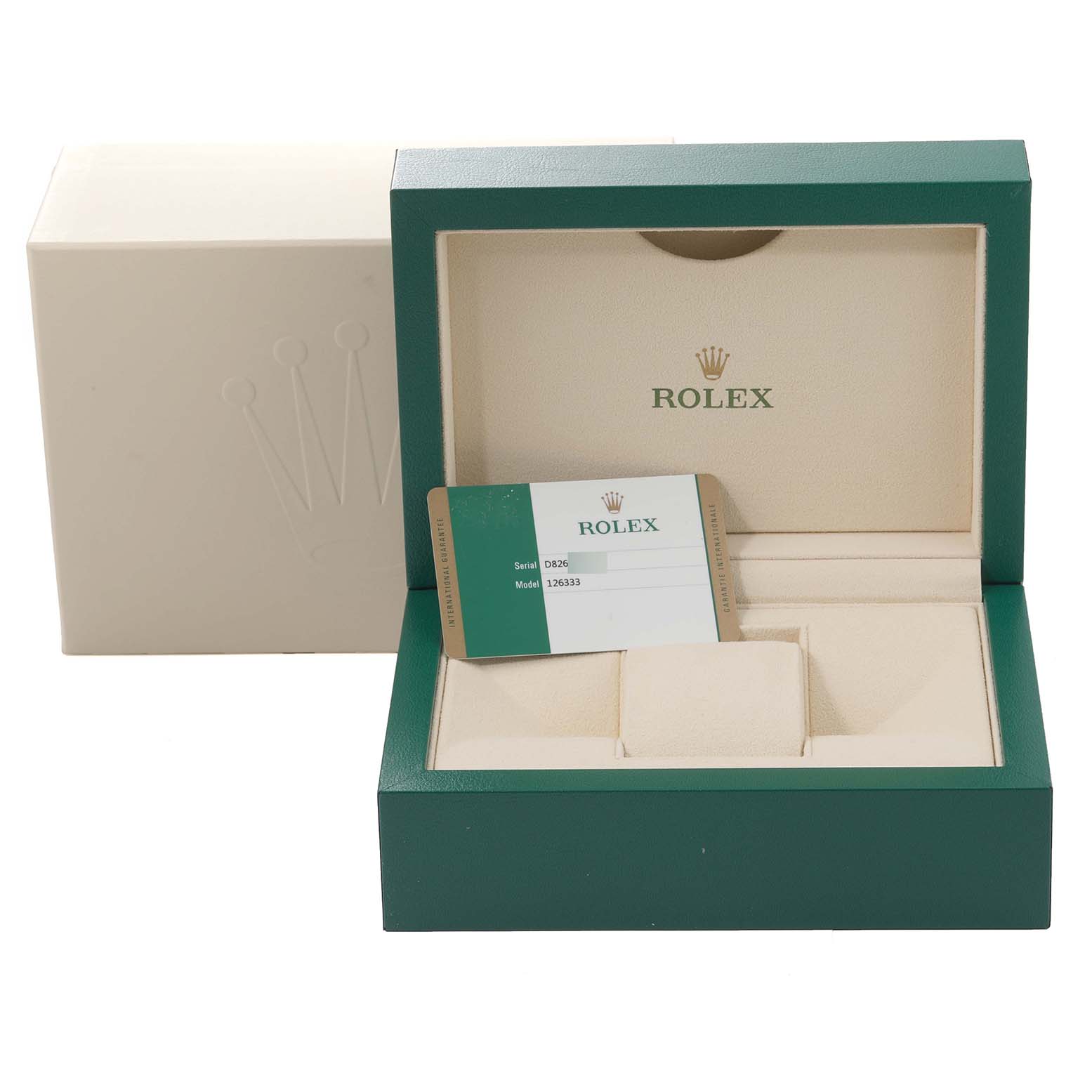 The image shows an open green and beige Rolex box for the Datejust 41 model, with a serial card inside.