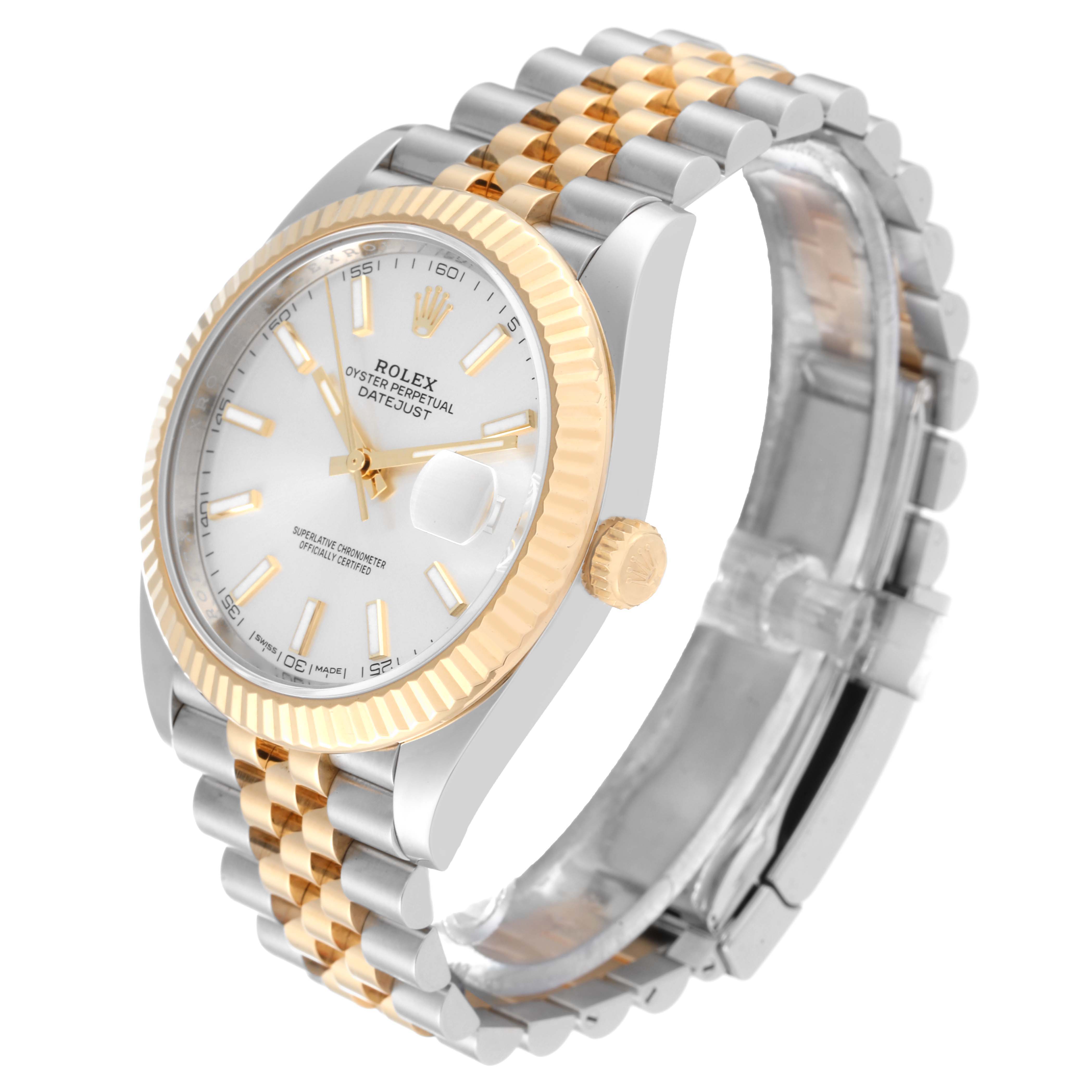 The Rolex Datejust 41 126333 Men's Steel and Gold (two tone) Silver Dial 126333 Men's Steel and Gold (two tone) Silver Dial watch is shown from an angled side view, highlighting its face, bezel, crown, and Jubilee bracelet.