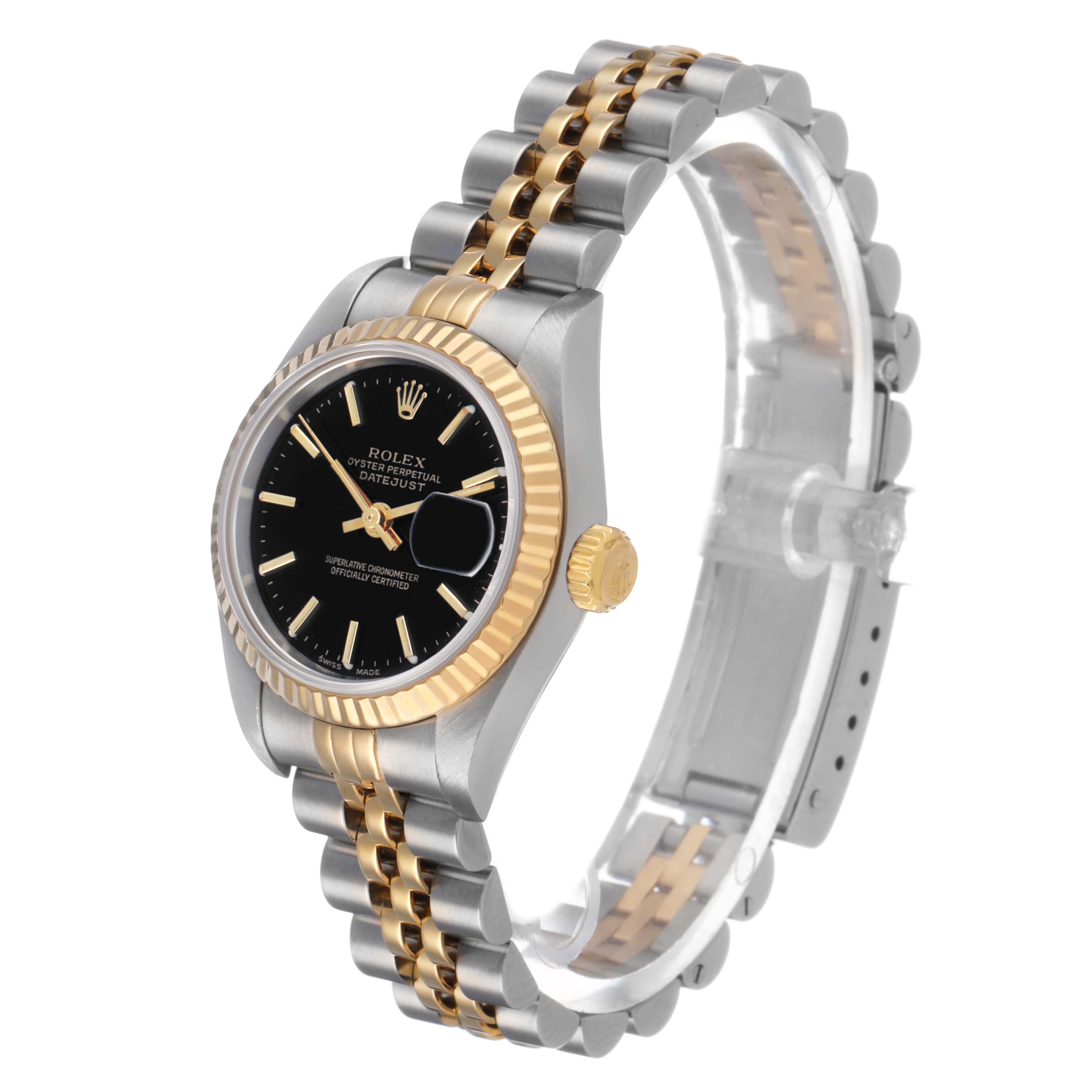 The Rolex Datejust 79173 Women's Steel and Gold (two tone) Black Dial watch is shown at a three-quarter angle, highlighting its two-tone bracelet, bezel, and crown.