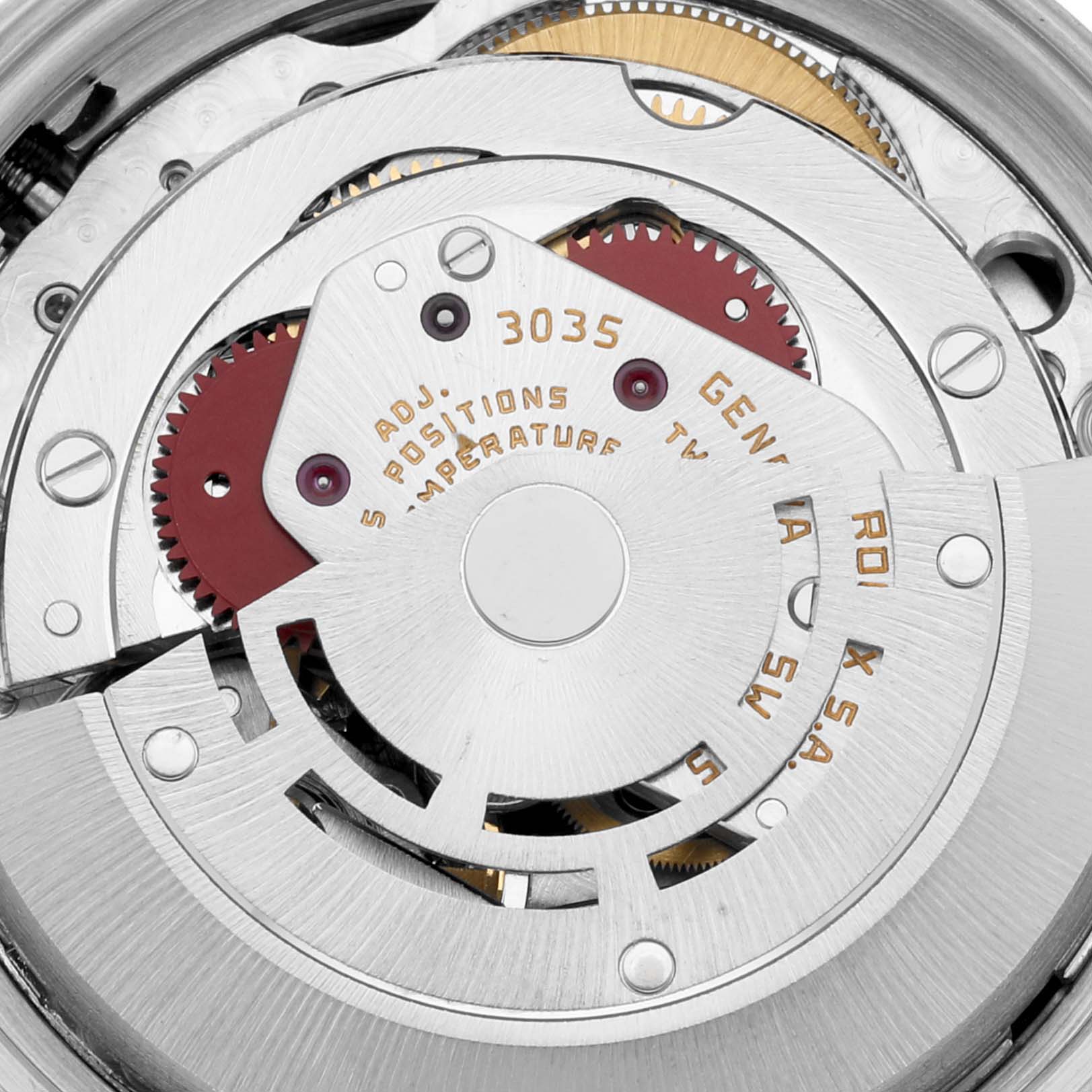 This image shows the internal movement mechanism of the Vintage Collection Rolex 3035 watch, highlighting its intricate gears and components.