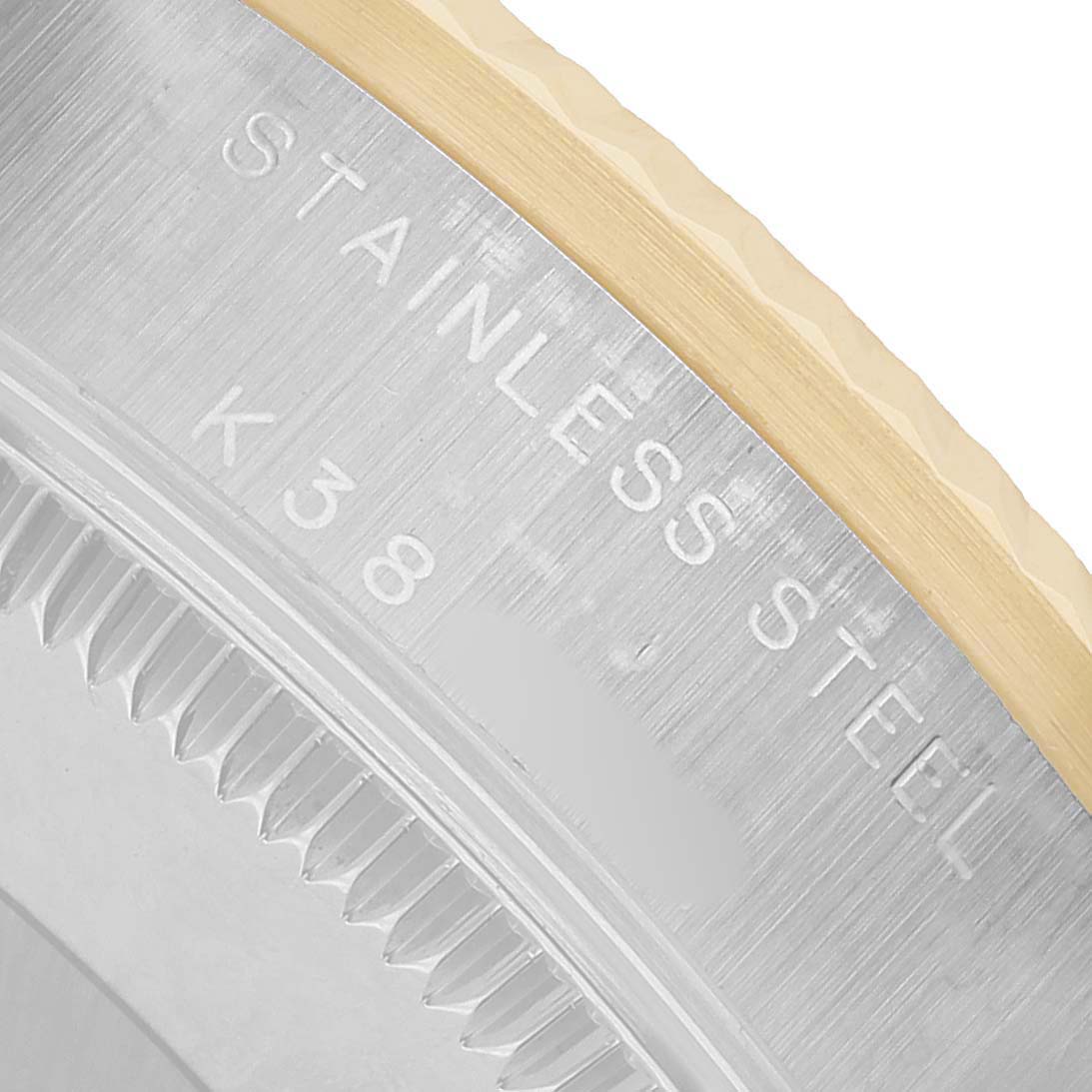 The image shows a close-up side view of a Rolex Datejust 78273 Women's Steel and Gold (two tone) White Dial model, focusing on the stainless steel and part of the bezel.