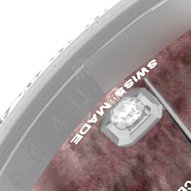 The image shows a close-up of a Rolex Datejust 116244 Men's Stainless Steel Mother of Pearl Dial 116244 Men's Stainless Steel Mother of Pearl Dial dial, highlighting a jewel marker and the "SWISS MADE" text.