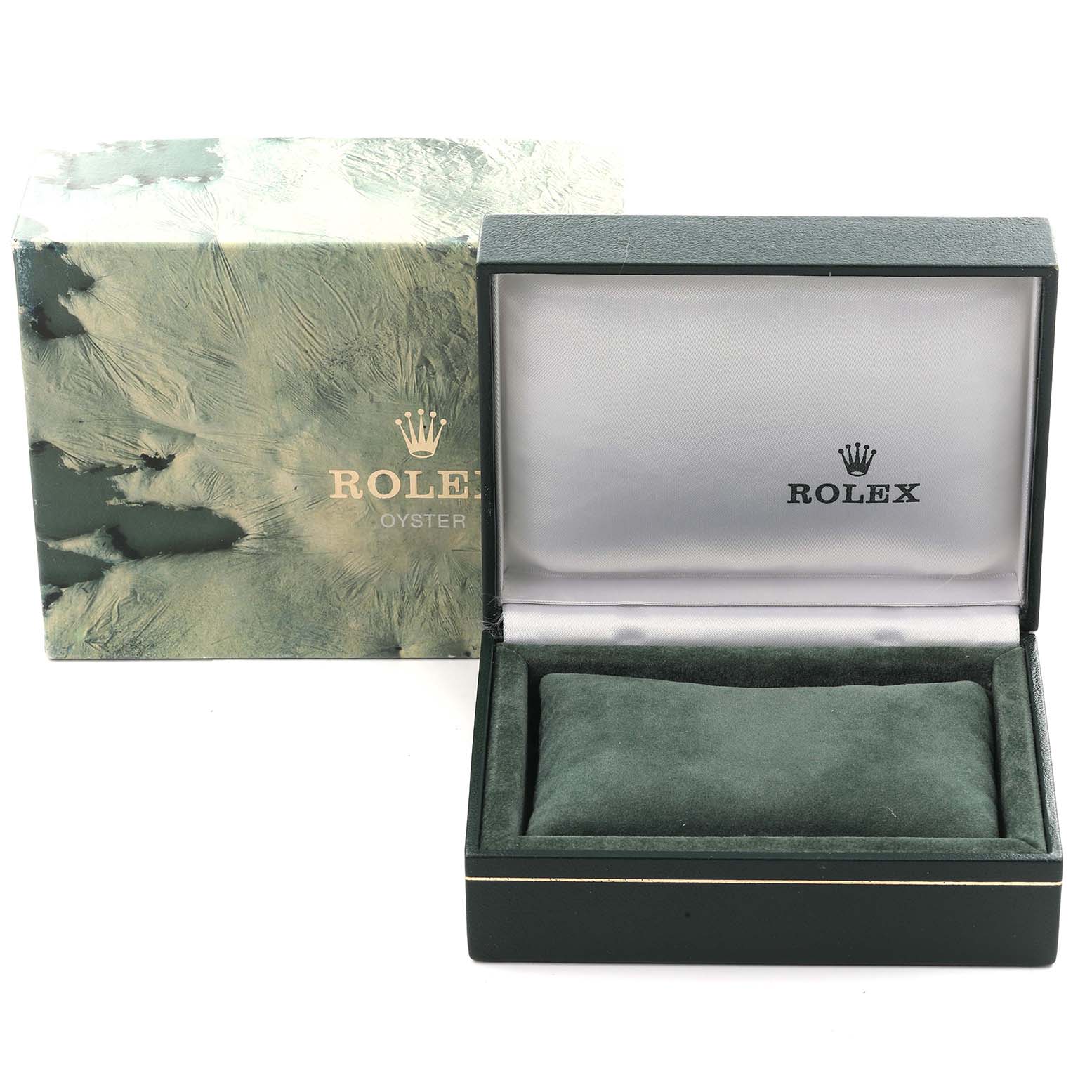 The image shows the open box and packaging for a Rolex Vintage Collection 16014 Men's Stainless Steel Silver Dial 16014 Men's Stainless Steel Silver Dial watch, featuring a green cushion inside.