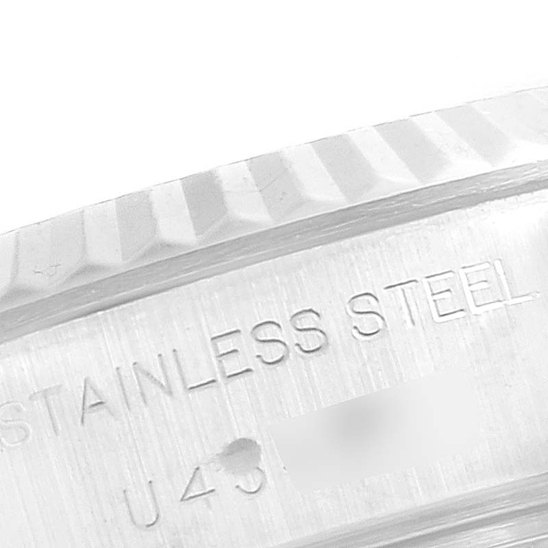 The image shows a close-up of the stainless steel case back with engravings of a Rolex Datejust 69174 Women's Stainless Steel Silver Dial 69174 Women's Stainless Steel Silver Dial watch.