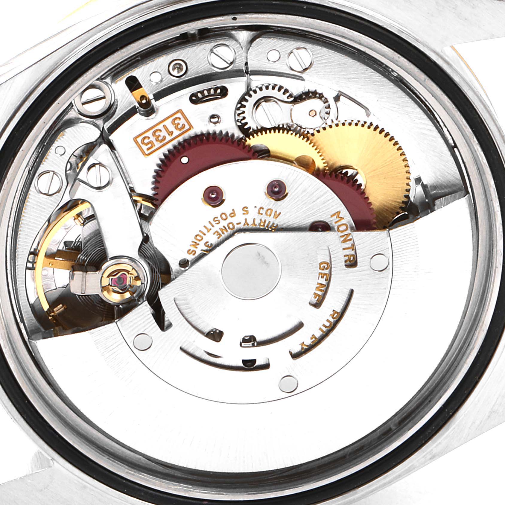 The image shows a close-up of the movement mechanism of a Rolex Datejust 16233 Men's Steel and Gold (two tone) Champagne Dial 16233 Men's Steel and Gold (two tone) Champagne Dial watch, highlighting gears and internal components.