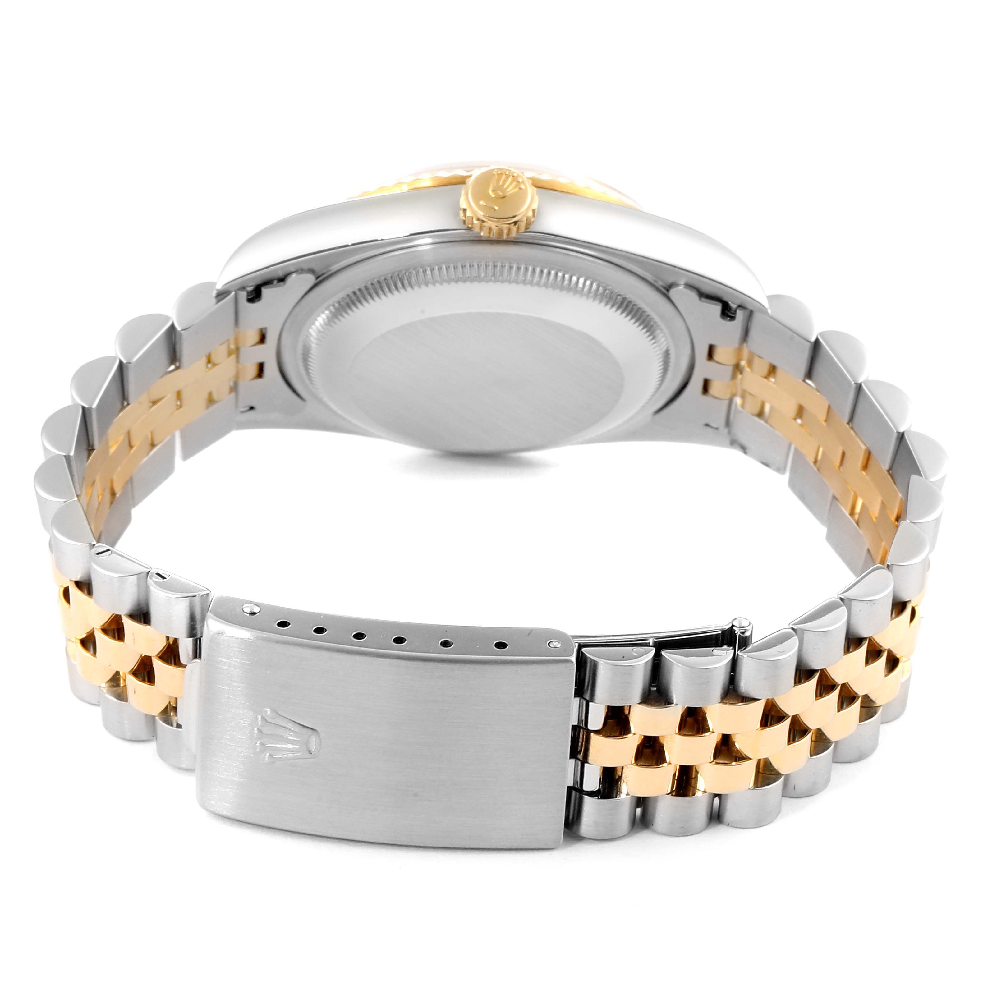 The image shows the back case, crown, and bracelet of a Rolex Datejust 16233 Men's Steel and Gold (two tone) Champagne Dial 16233 Men's Steel and Gold (two tone) Champagne Dial watch from a rear angle.