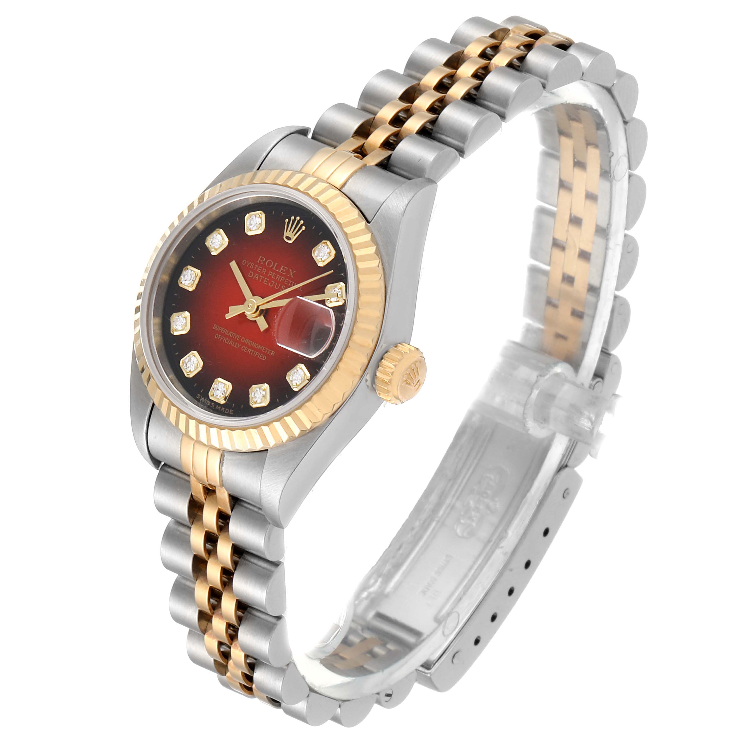 The Rolex Datejust 79173 Women's Steel and Gold (two tone) Red Dial 79173 Women's Steel and Gold (two tone) Red Dial watch is shown at a slight angle, highlighting the dial, bezel, crown, and two-tone bracelet.
