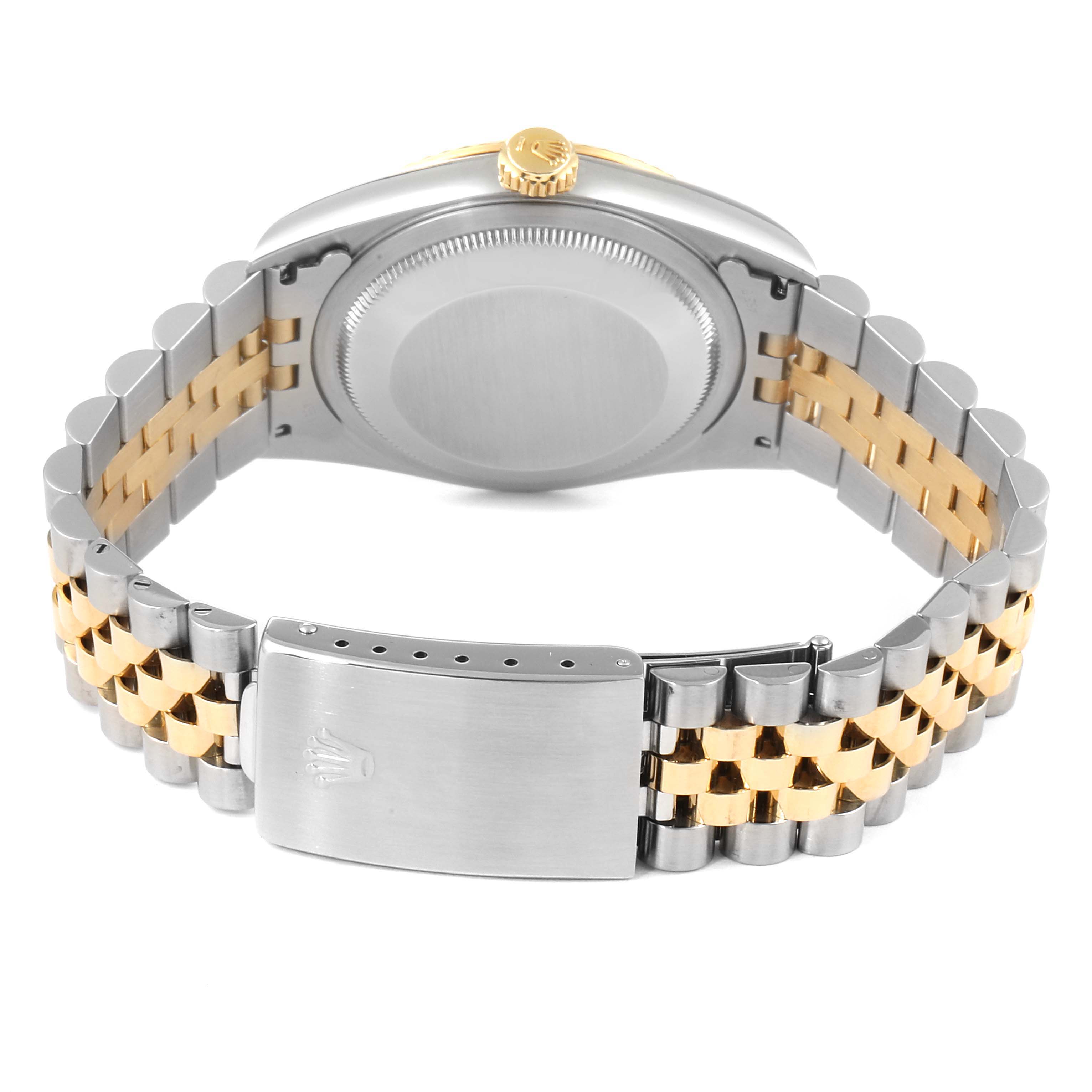 The image shows the back and clasp of a Rolex Datejust 16233 Men's Steel and Gold (two tone) White Dial 16233 Men's Steel and Gold (two tone) White Dial watch with a two-tone bracelet.