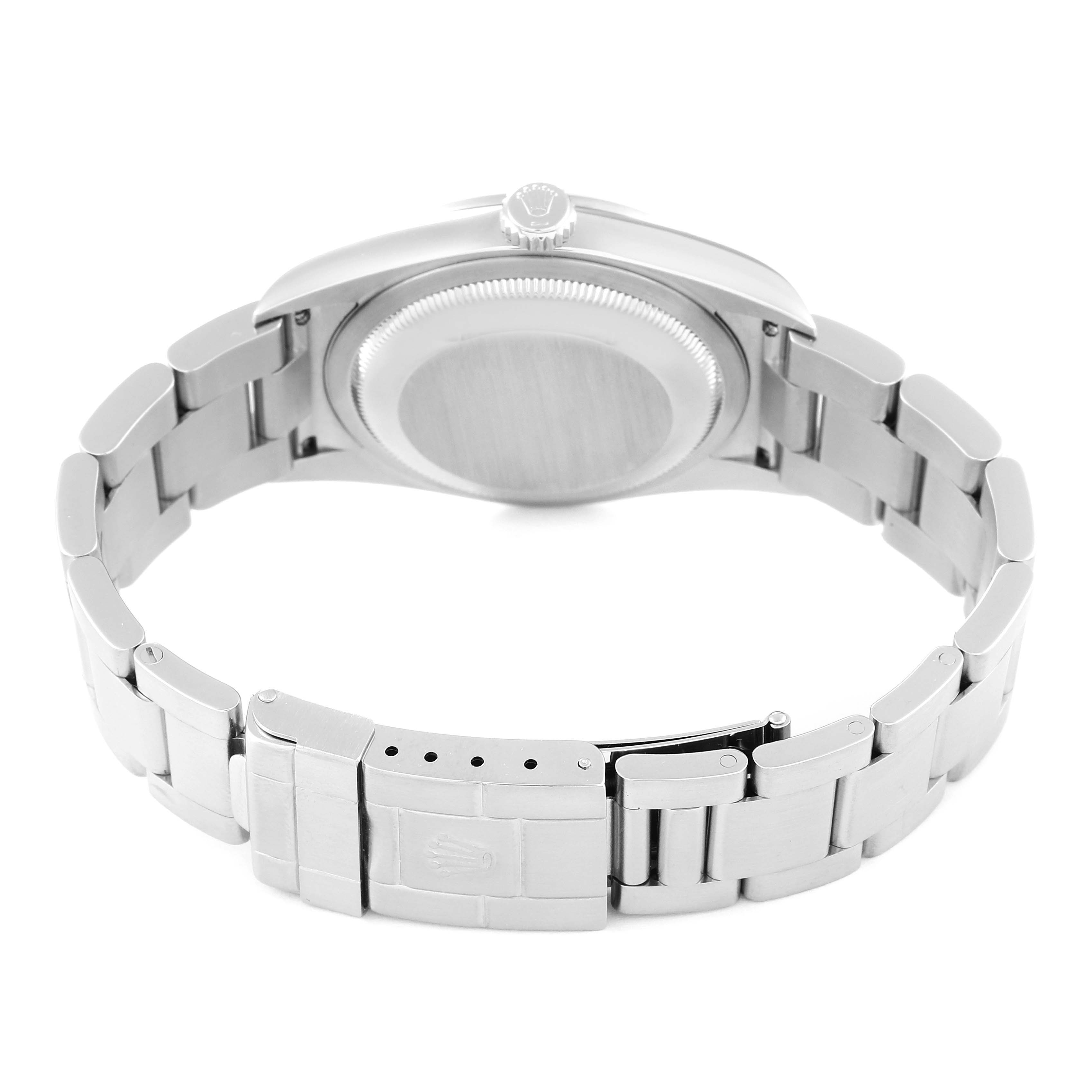 The Rolex Explorer 114270 Men
s Stainless Steel Black Dial 114270 Men
s Stainless Steel Black Dial watch is shown from the rear angle, highlighting the case back, bracelet, and clasp.