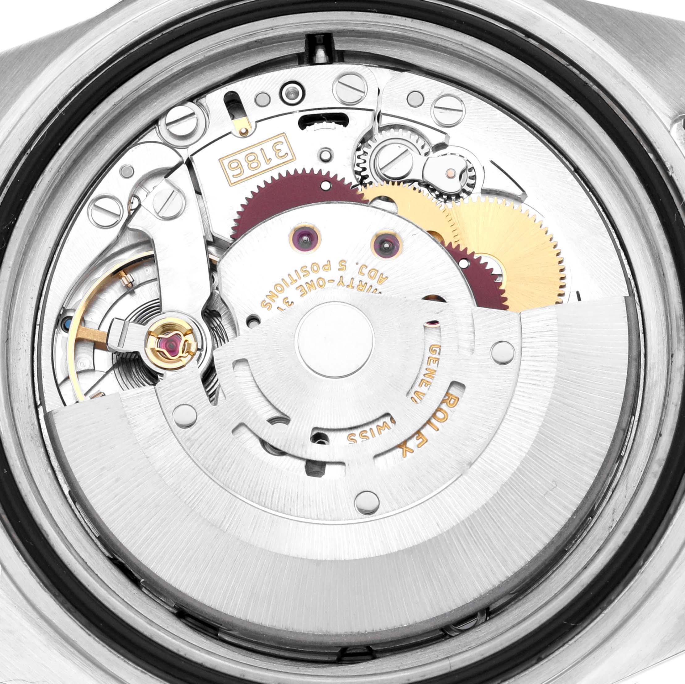 The image shows the movement of a Rolex GMT-Master 16710 Men's Stainless Steel Black Dial 16710 Men's Stainless Steel Black Dial watch from the back, highlighting its internal mechanical components.