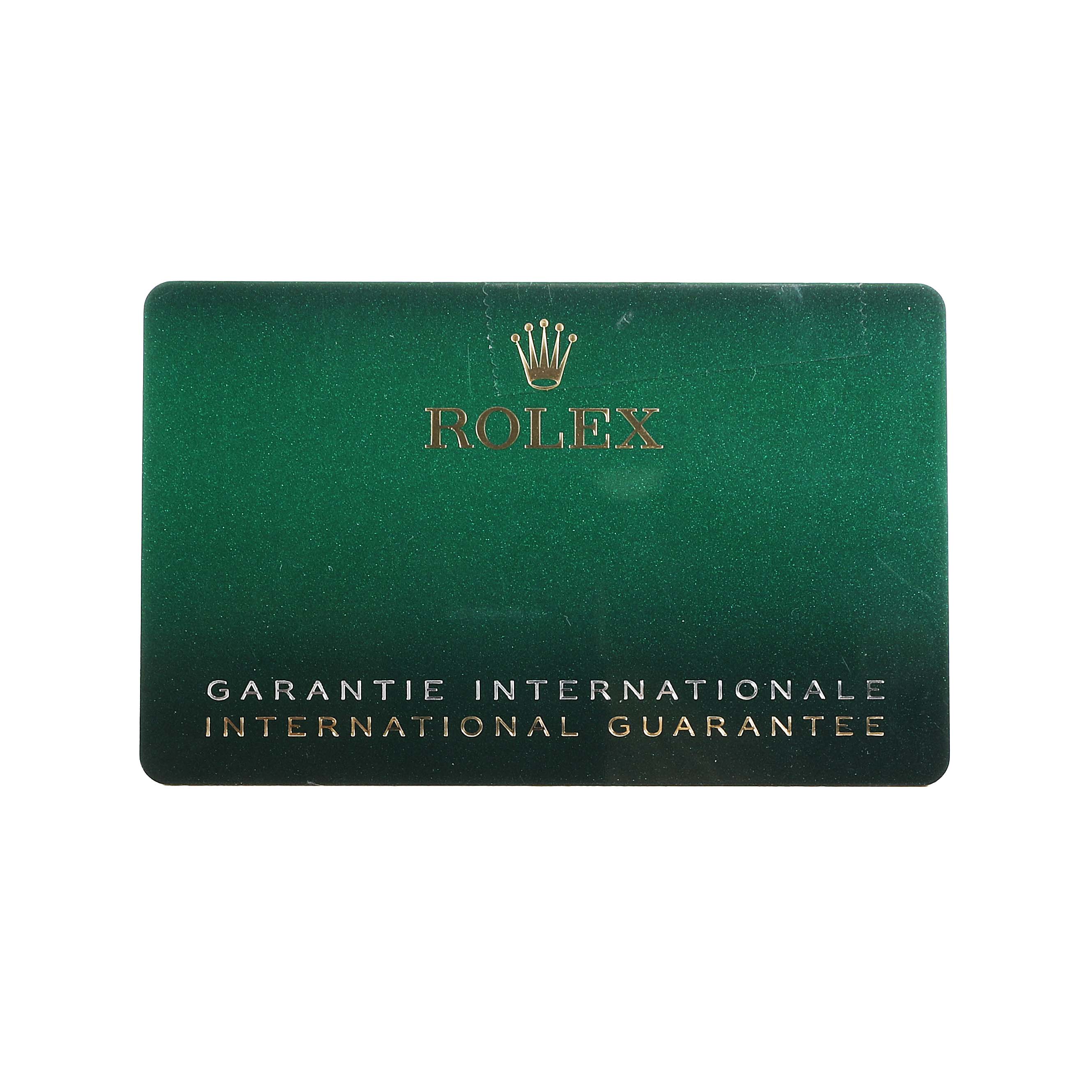 The image shows a green Rolex international guarantee card for a GMT-Master model.