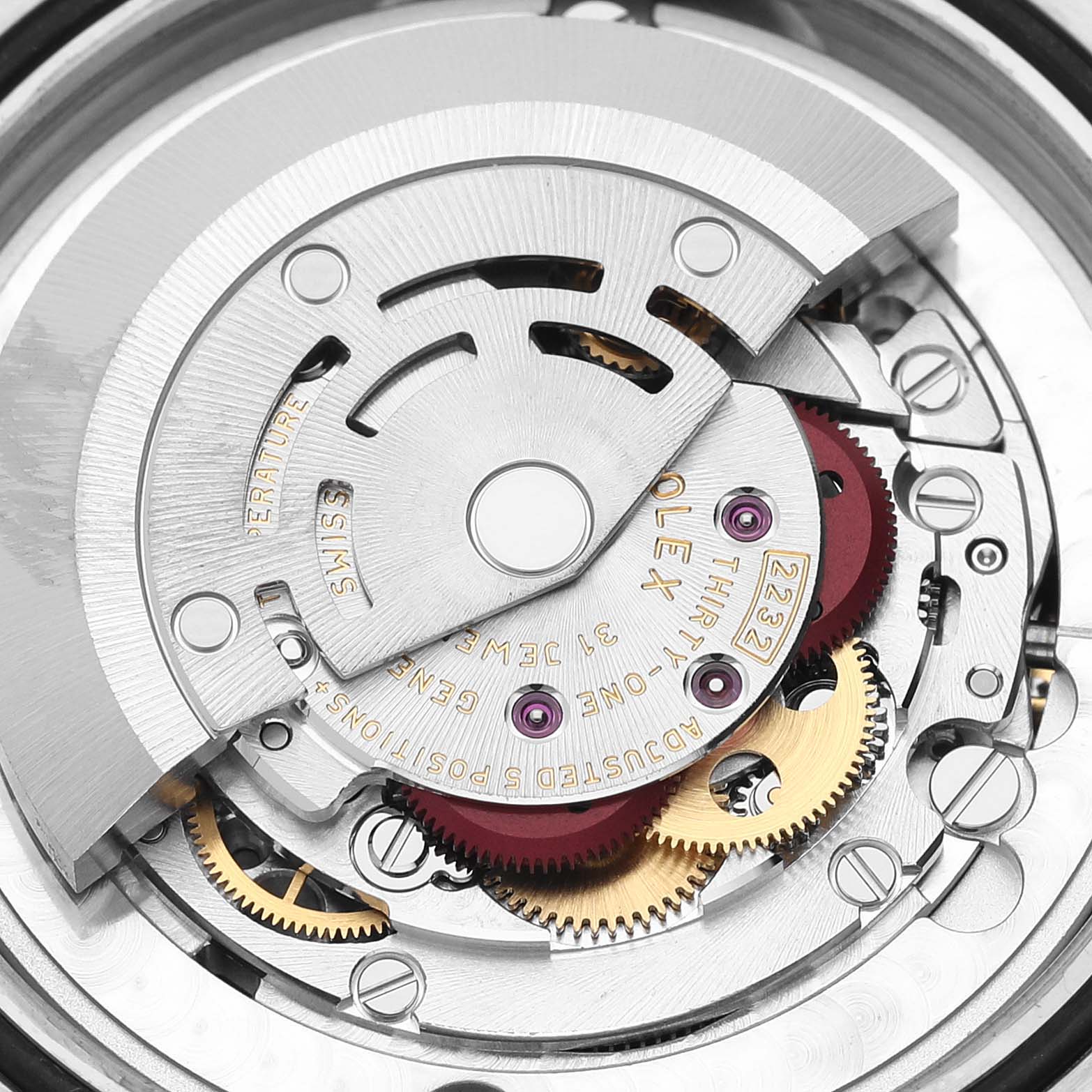 The image shows a close-up view of the movement mechanism of the Rolex Oyster Perpetual 124200 Men
s Stainless Steel Blue Dial 124200 Men
s Stainless Steel Blue Dial watch.