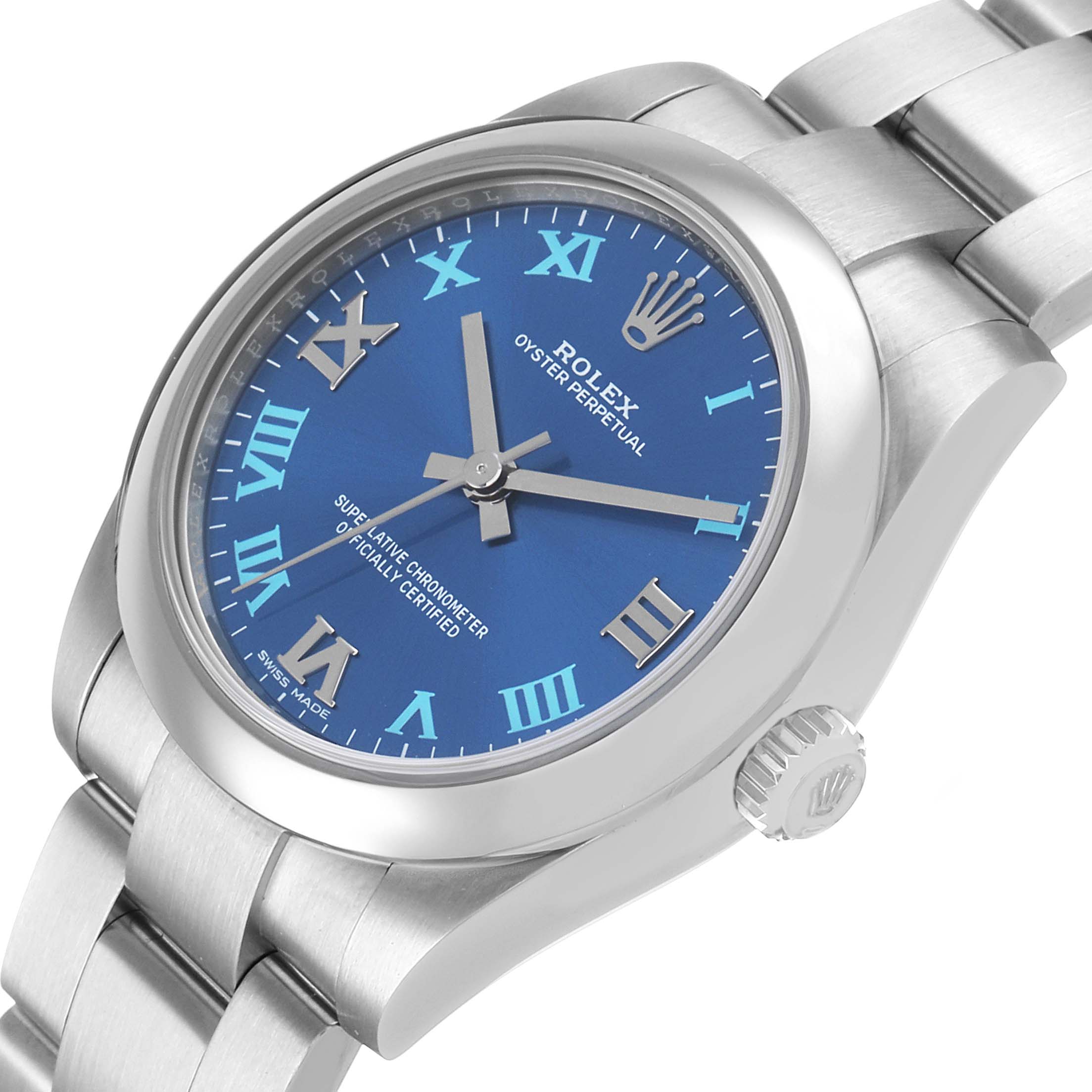 The Rolex Oyster Perpetual 177200 Women's Stainless Steel Blue Dial watch is shown at an angle highlighting the blue dial, crown, and part of the bracelet.
