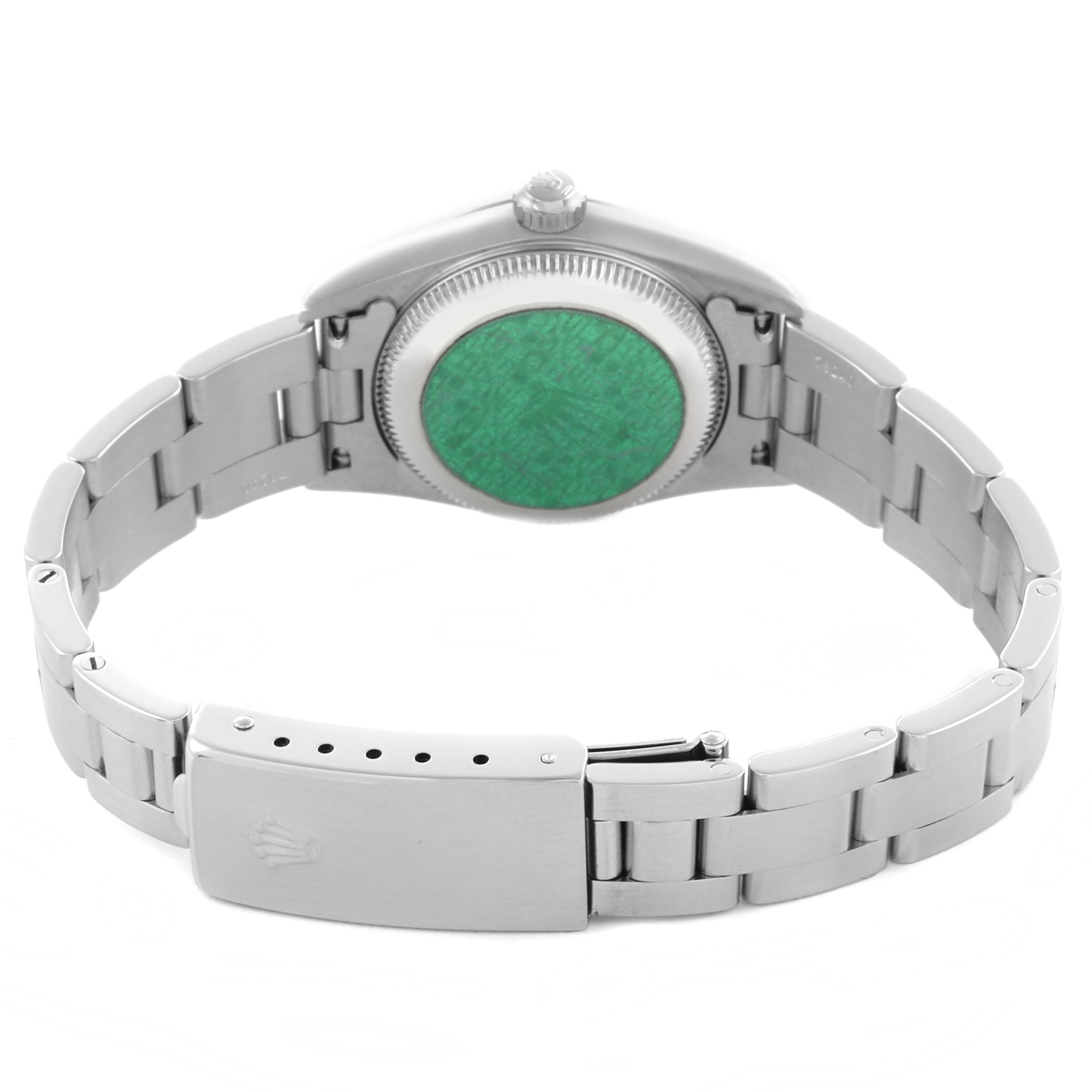 The image shows the back of a Rolex Oyster Perpetual 76080 Women's Stainless Steel Silver Dial 76080 Women's Stainless Steel Silver Dial watch, focusing on the clasp and the bracelet from a rear angle.