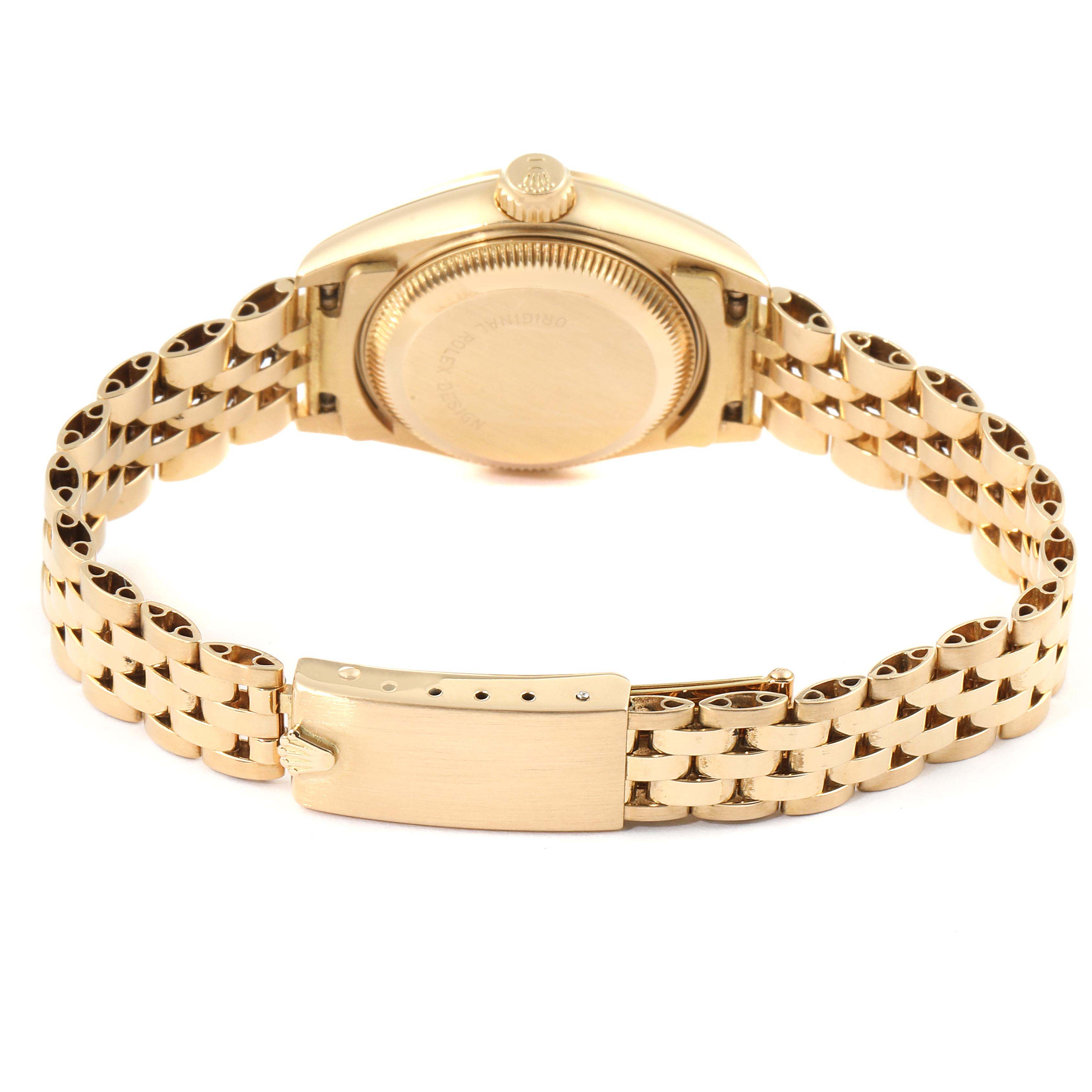 This image shows the back case and bracelet clasp of a Rolex President 69168 Women's Yellow Gold Champagne Dial 69168 Women's Yellow Gold Champagne Dial model watch, taken from a rear angle.