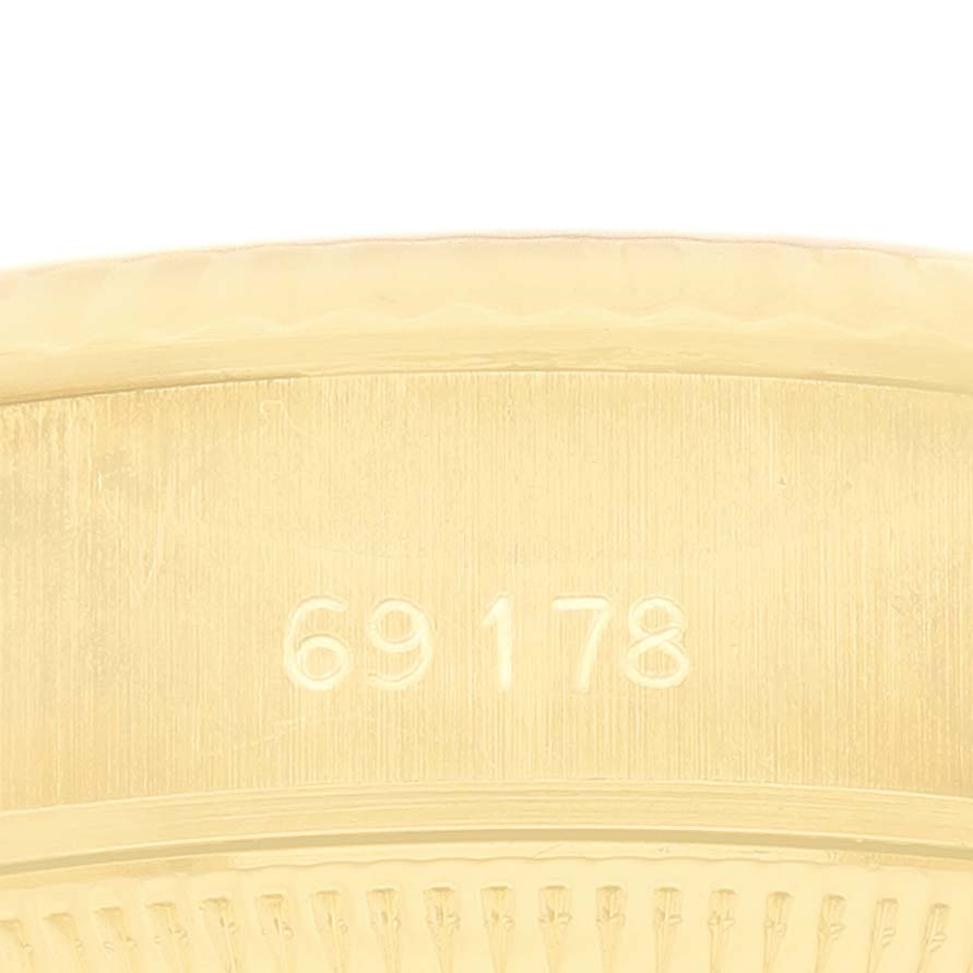 The image shows a close-up of the model number "69178" on the Rolex President 69178 Women's Yellow Gold Champagne Dial watch bezel.
