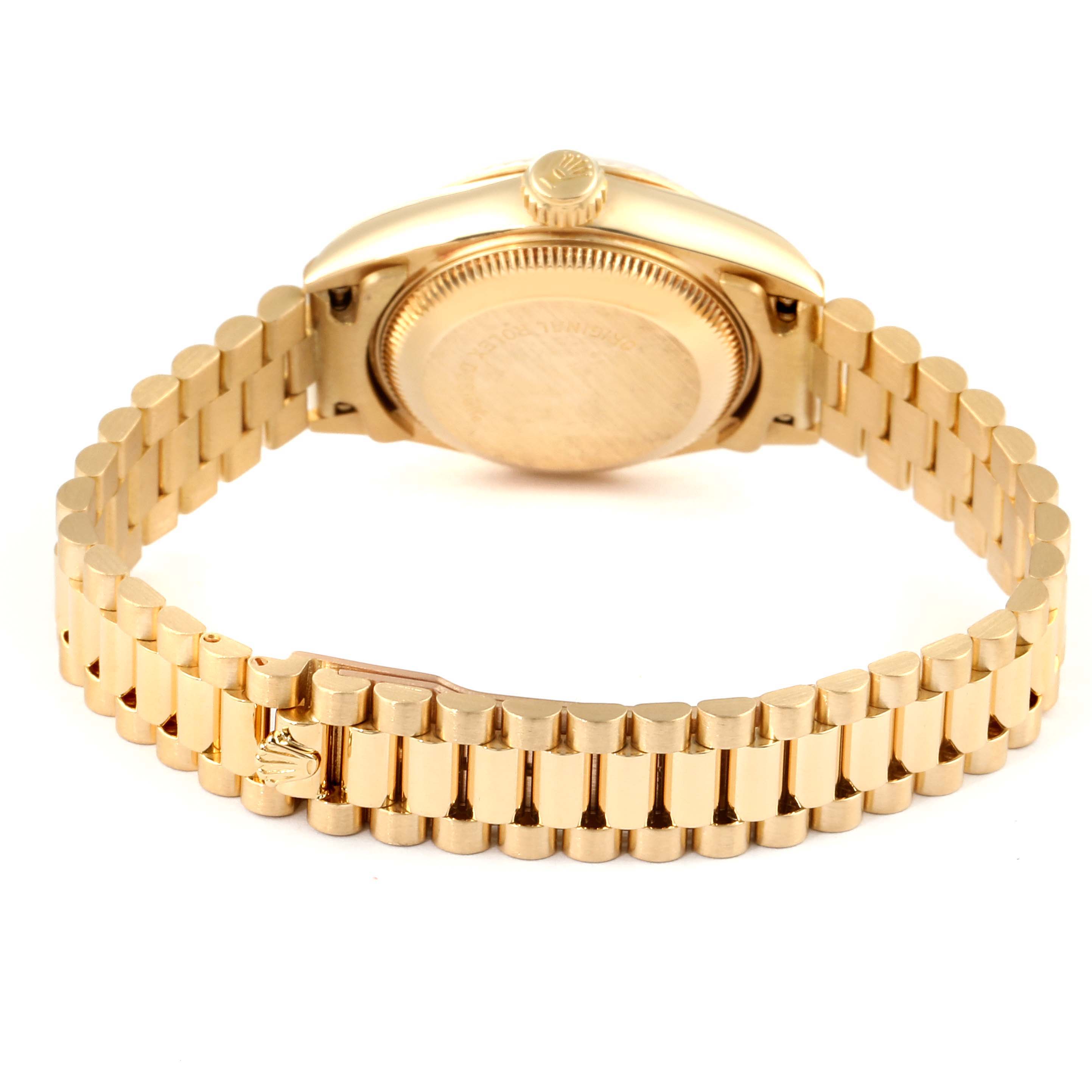 This image shows the back side and bracelet of a Rolex President 69178 Women's Yellow Gold Champagne Dial 69178 Women's Yellow Gold Champagne Dial model watch.