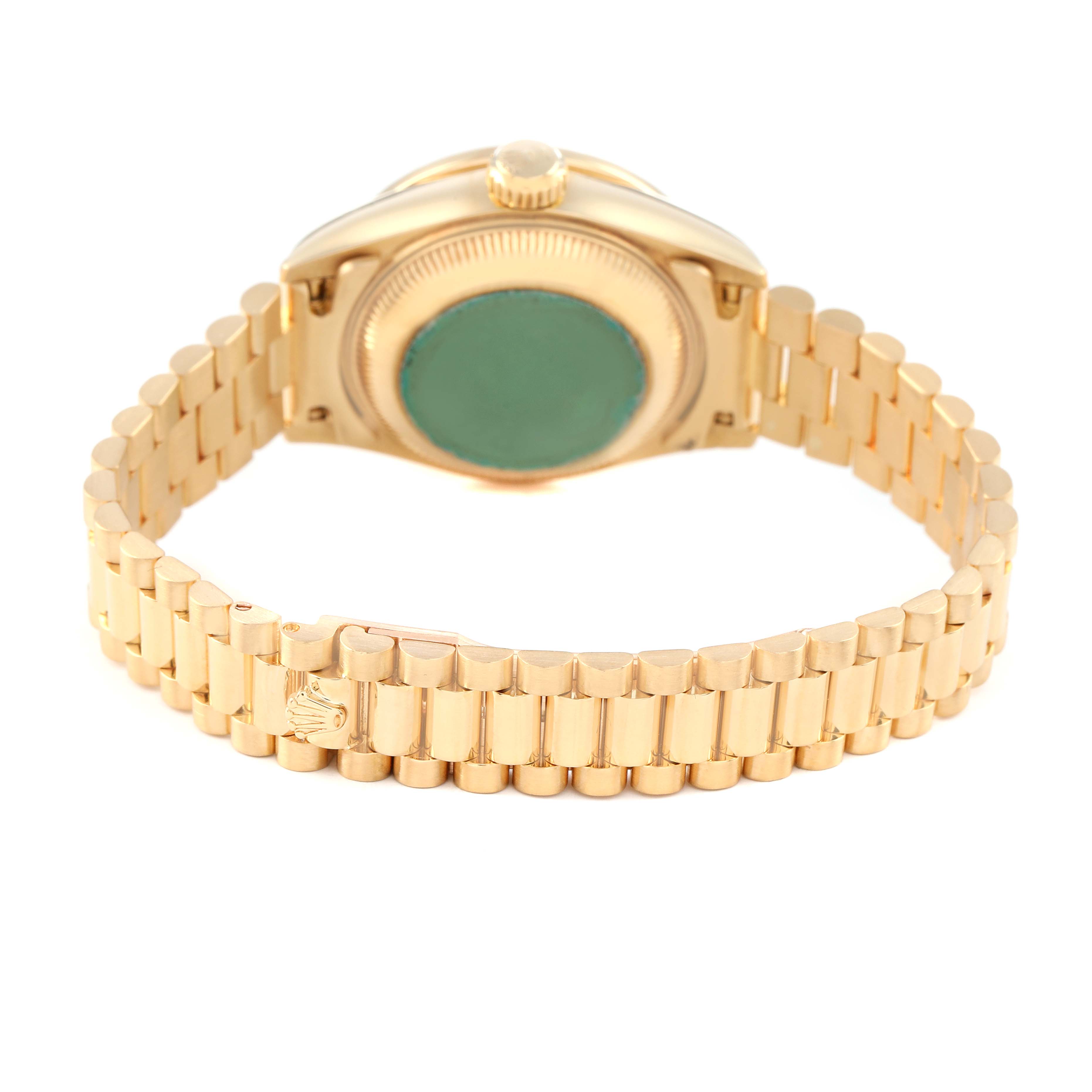 The image shows the back and bracelet of a Rolex President 69068 Women's Yellow Gold Champagne Dial model, featuring its distinctive gold links and case back.