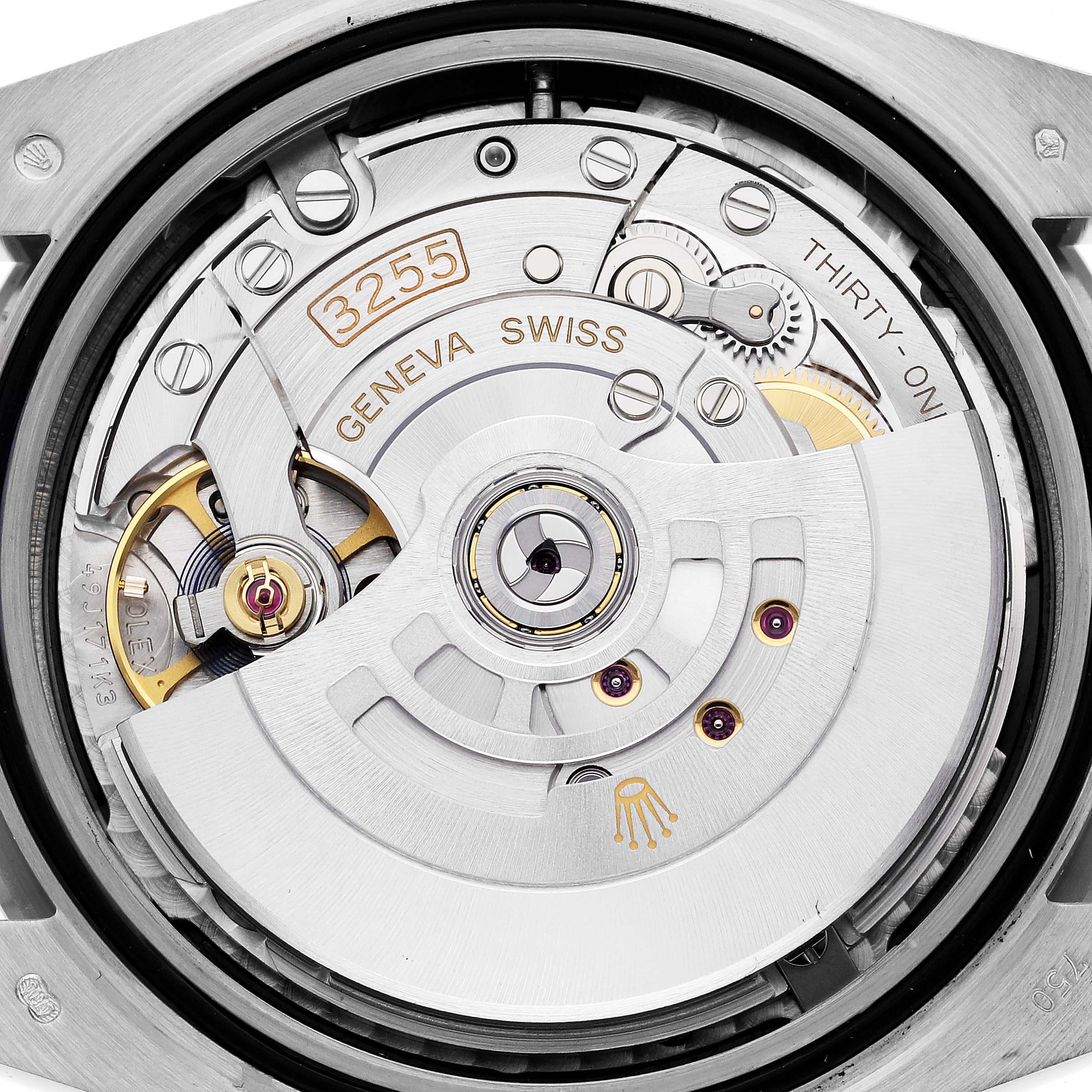 The image shows a detailed close-up of the movement inside the Rolex President 228349RBR Men's White Gold Black Dial 228349RBR Men's White Gold Black Dial model watch, showcasing gears and components.