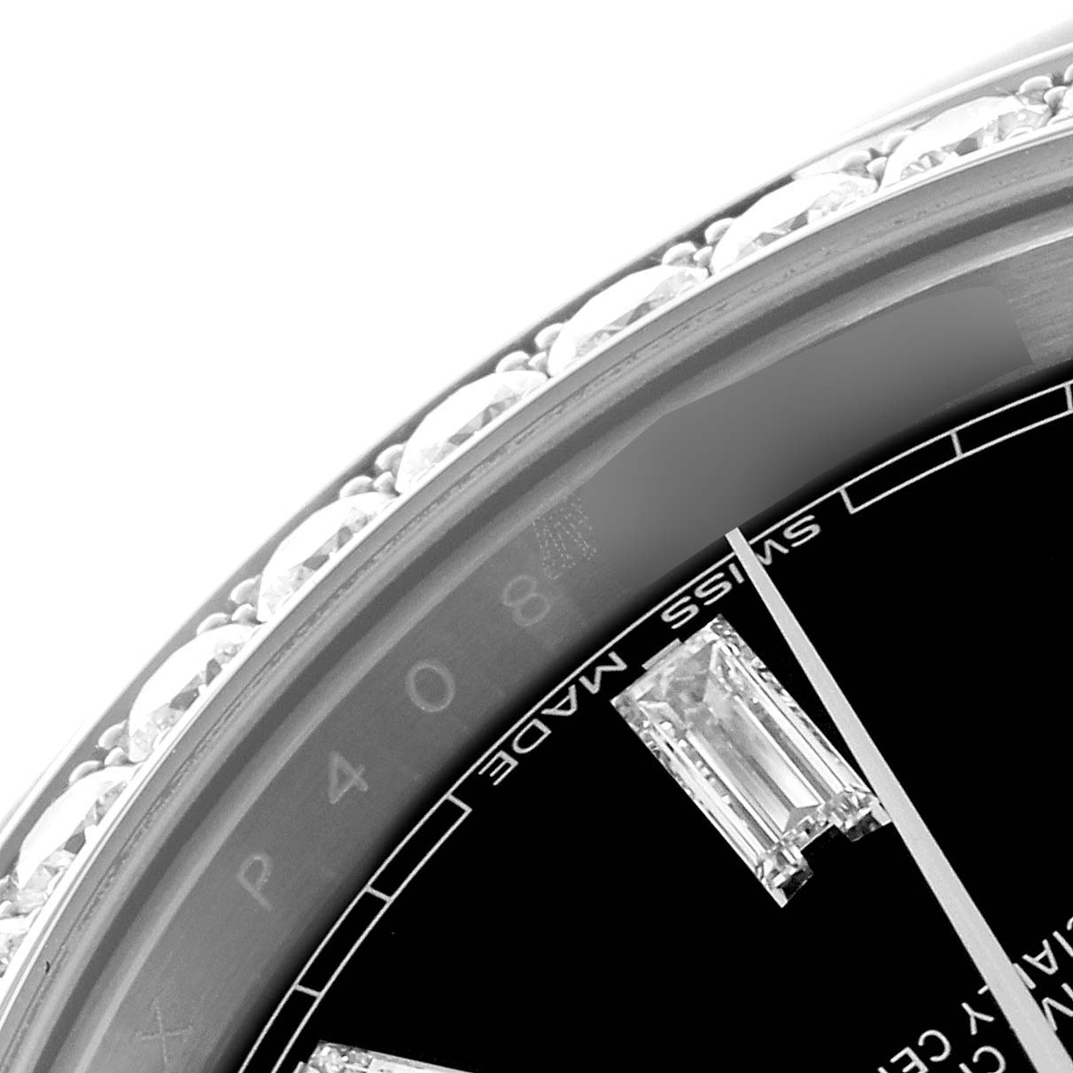 This is a close-up view of a Rolex President 228349RBR Men's White Gold Black Dial 228349RBR Men's White Gold Black Dial watch, showing part of the bezel with diamonds and a section of the dial.