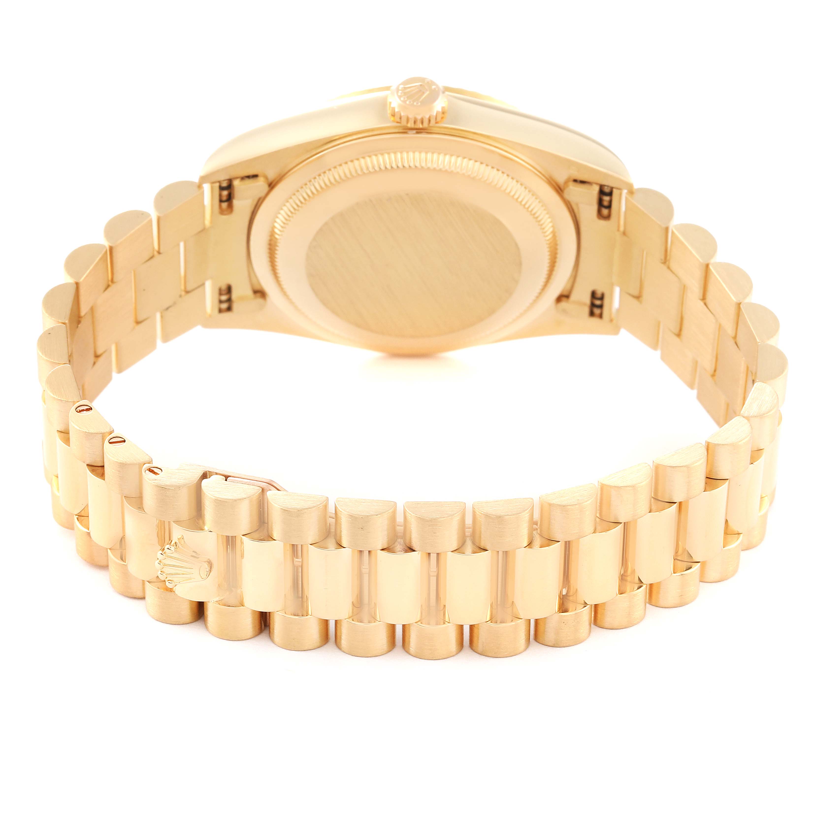 The image shows the back view of a Rolex President 18238A Men
s Yellow Gold Champagne Dial 18238A Men
s Yellow Gold Champagne Dial model watch, focusing on the case back and bracelet.