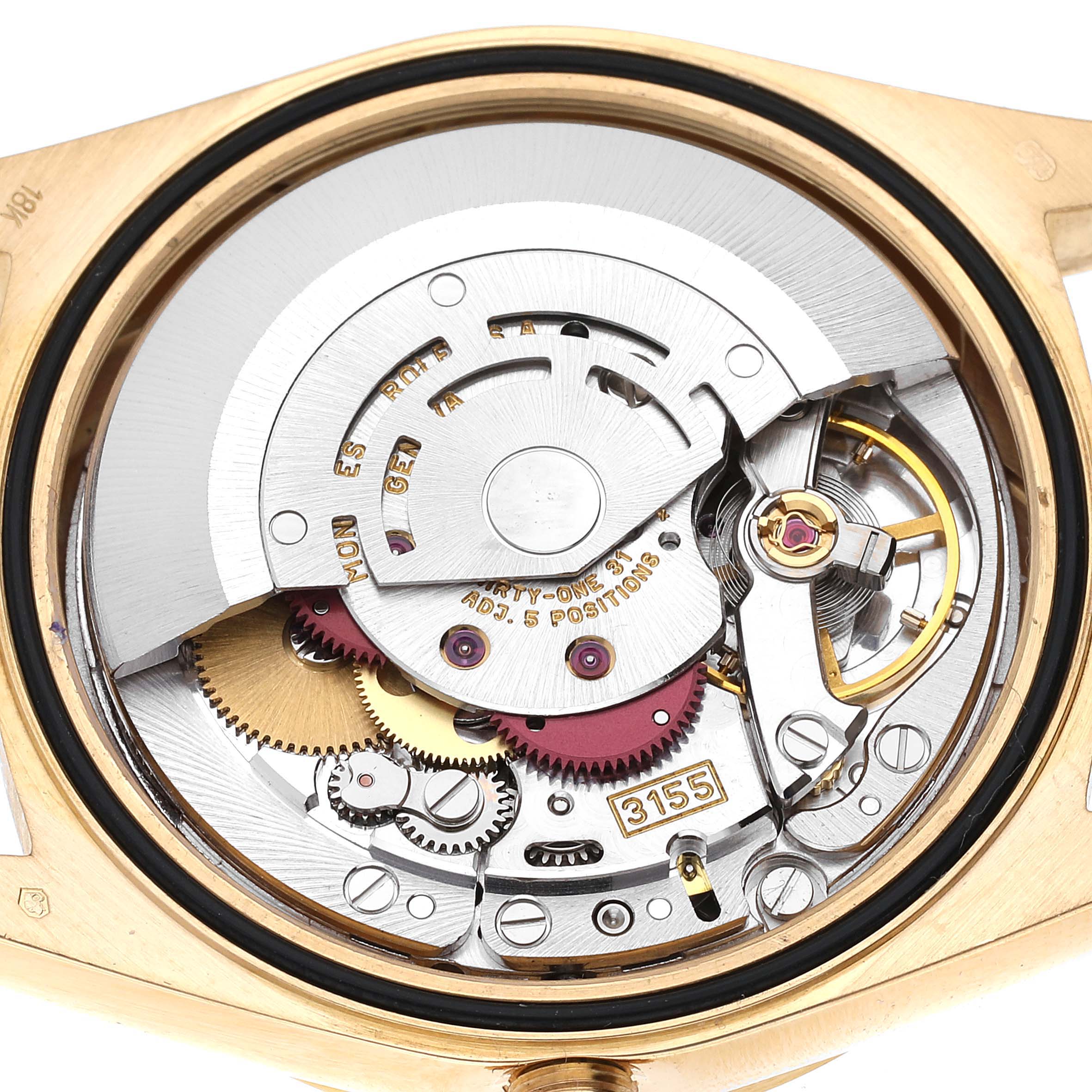 This image shows the internal mechanical movement of a Rolex President 18238A Men
s Yellow Gold Champagne Dial 18238A Men
s Yellow Gold Champagne Dial model watch from a close-up, rear angle.